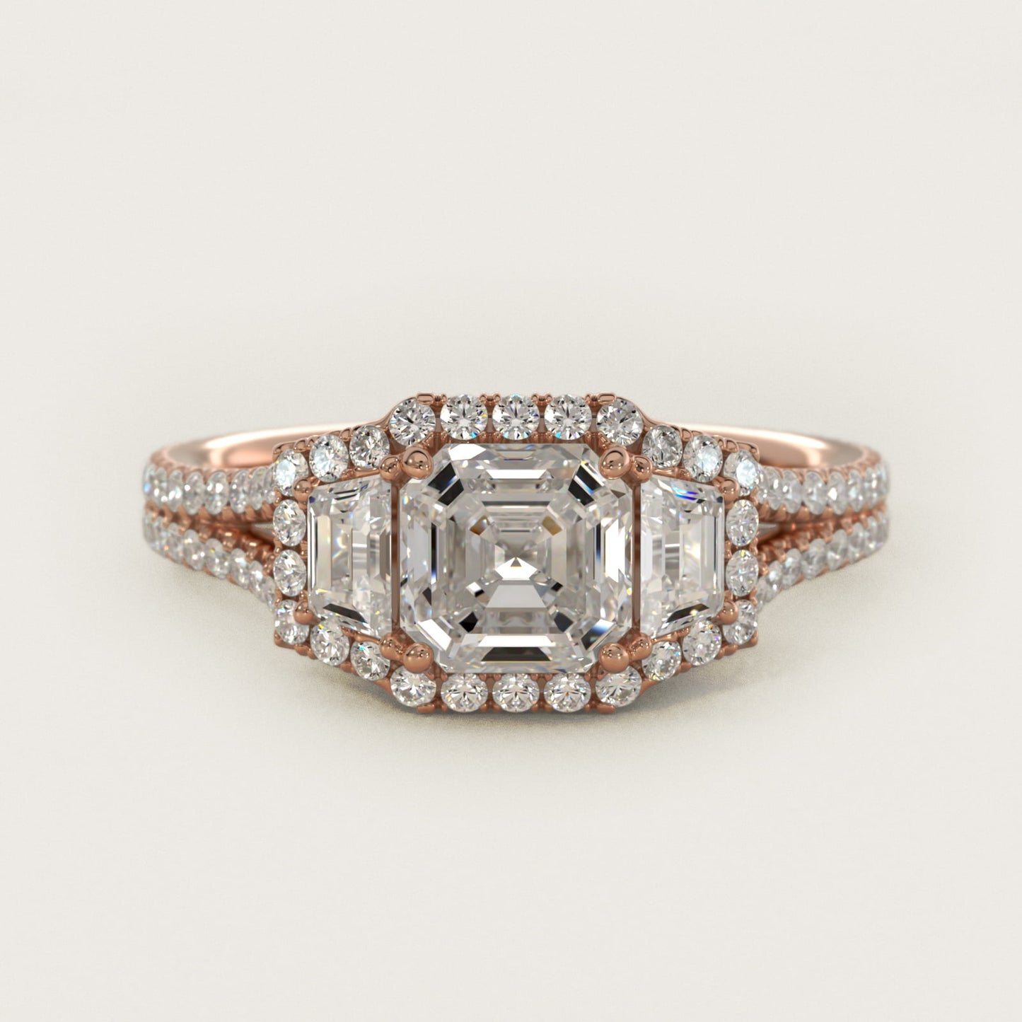The Gallery Collection™ Emerald Three Stone Halo Diamond Engagement Ring in 14k Rose Gold (1.50 ct. tw.) - Asscher Center