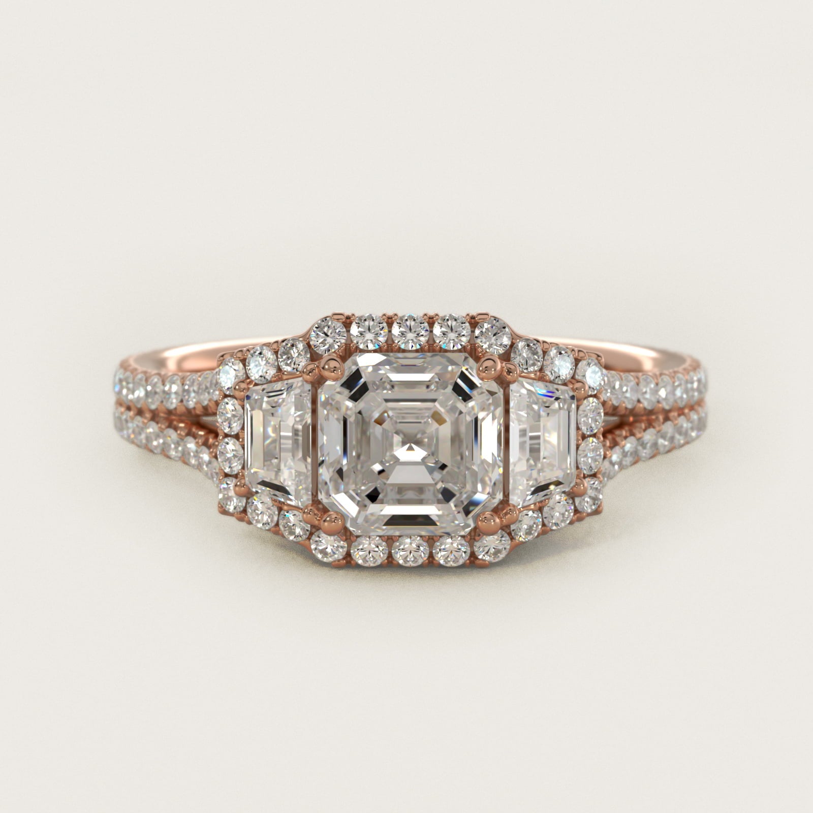 The Gallery Collection™ Emerald Three Stone Halo Diamond Engagement Ring in 18k Rose Gold (1.50 ct. tw.) - Asscher Center