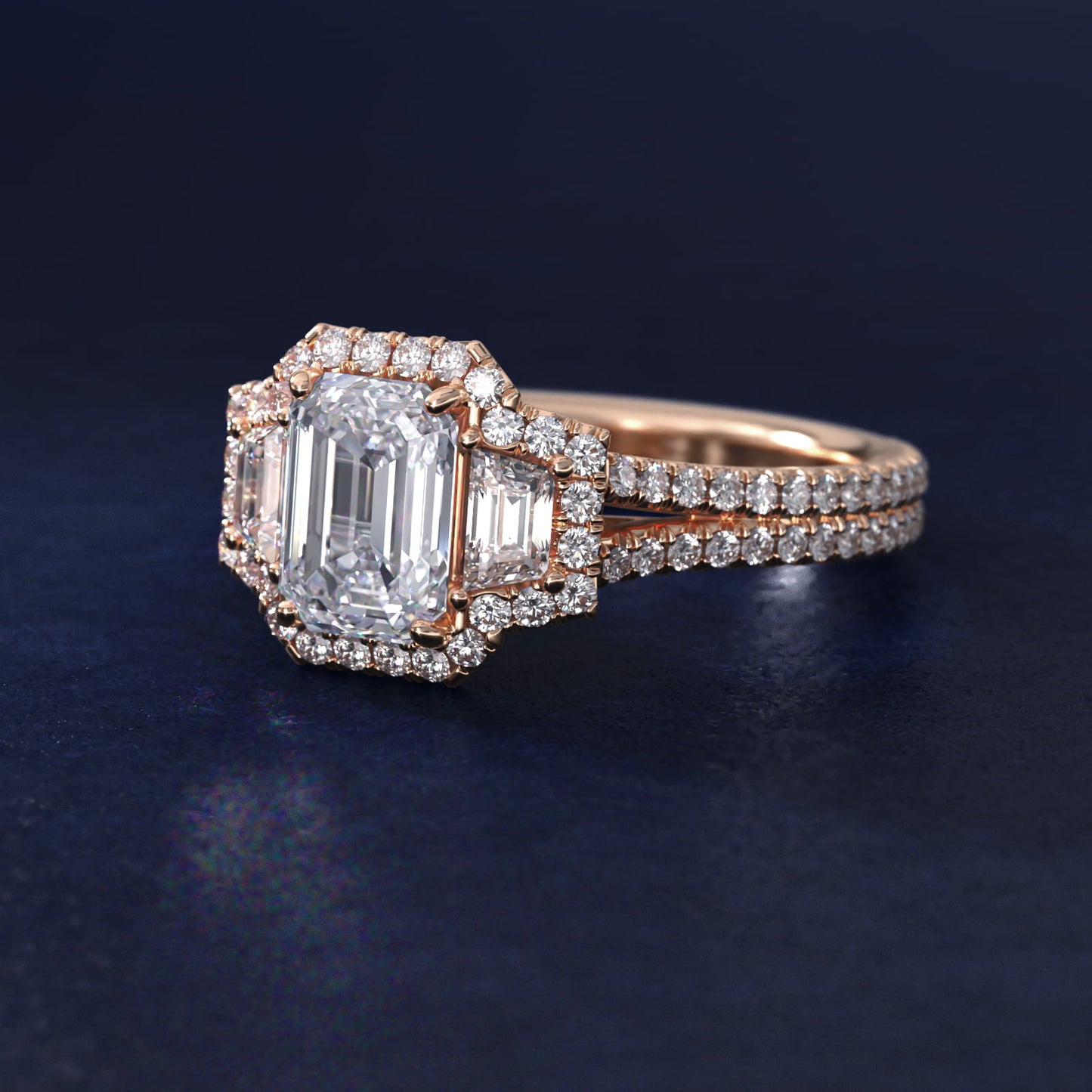 The Gallery Collection™ Emerald Three Stone Halo Diamond Engagement Ring in 14k Rose Gold (1.50 ct. tw.) - Emerald Center