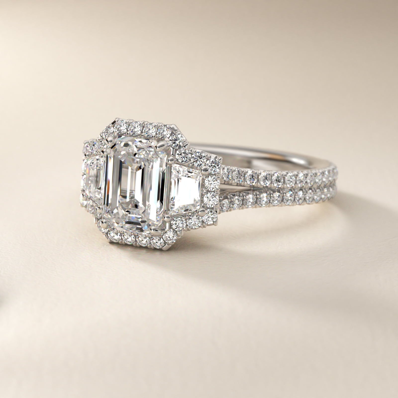 The Gallery Collection™ Emerald Three Stone Halo Diamond Engagement Ring in 18k White Gold (1.50 ct. tw.) - Emerald Center