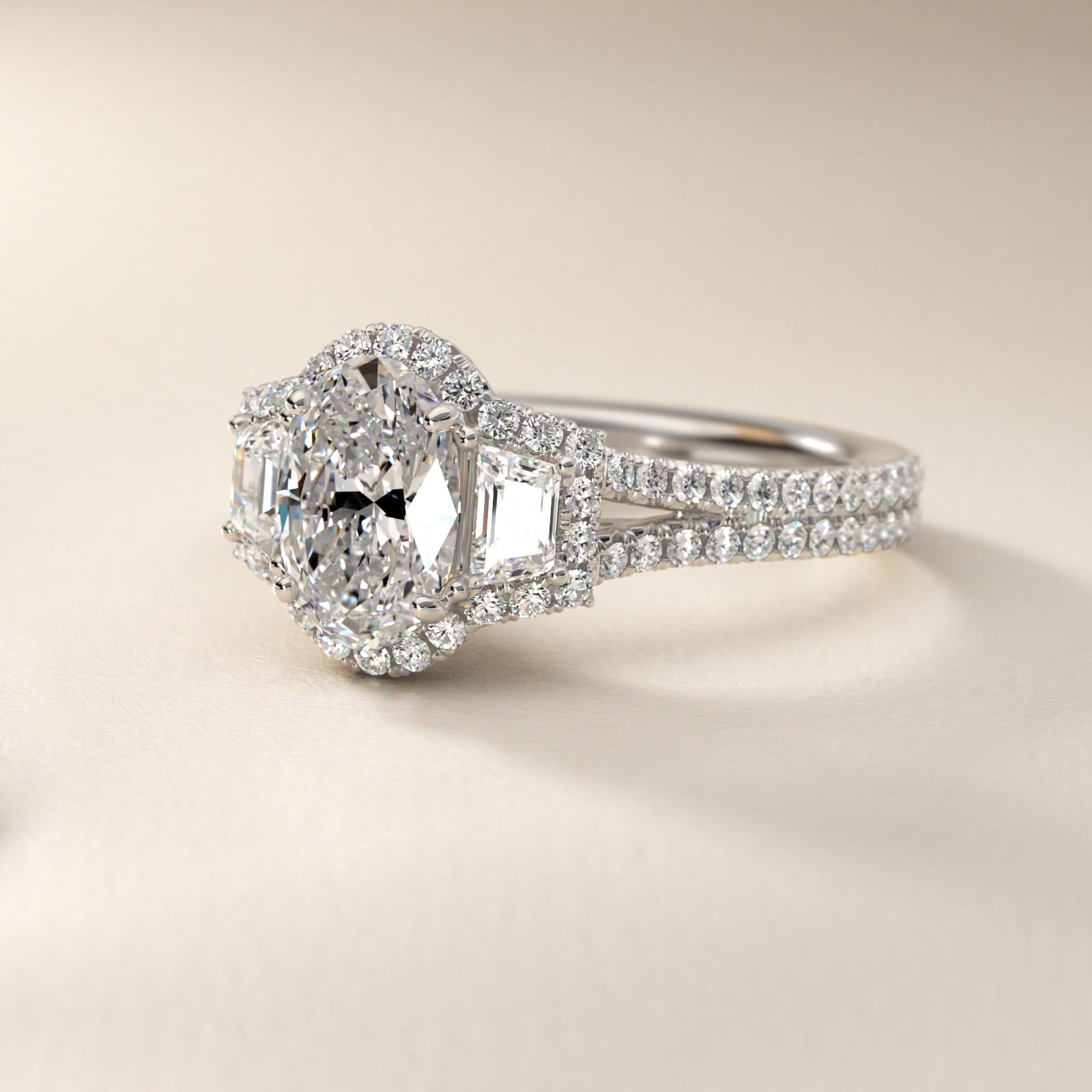 The Gallery Collection™ Emerald Three Stone Halo Diamond Engagement Ring in Platinum - Oval Center