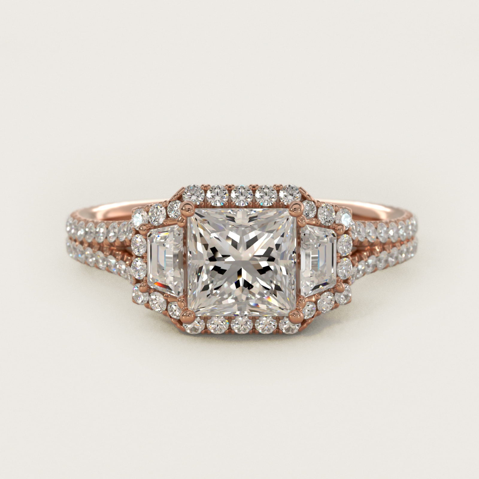 The Gallery Collection™ Emerald Three Stone Halo Diamond Engagement Ring in 14k Rose Gold (1.50 ct. tw.) - Princess Center