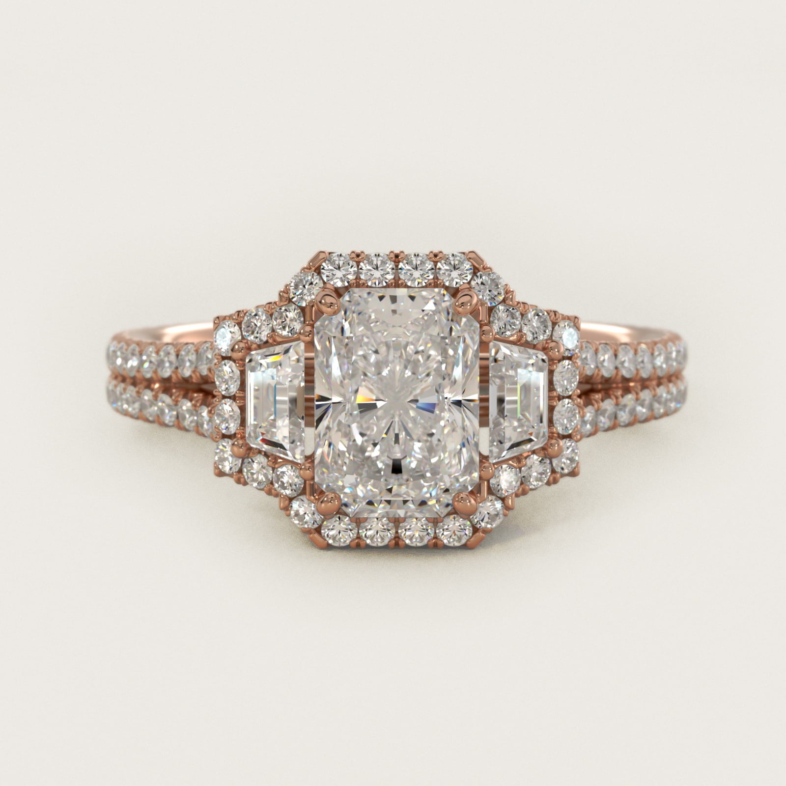 The Gallery Collection™ Emerald Three Stone Halo Diamond Engagement Ring in 14k Rose Gold (1.50 ct. tw.) - Radiant Center