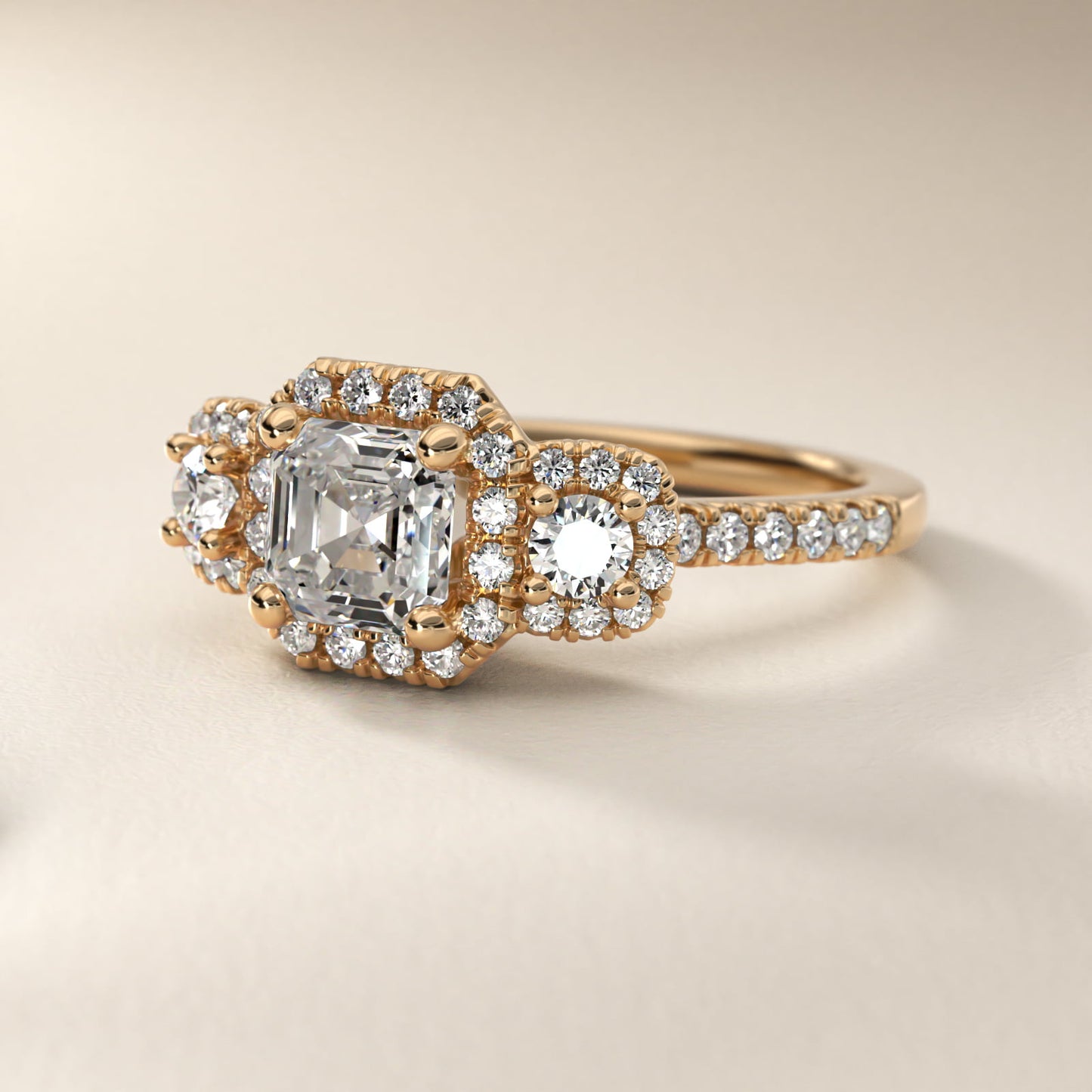 Three-Stone Cushion Halo Diamond Engagement Ring in 14k Yellow Gold - Asscher Center