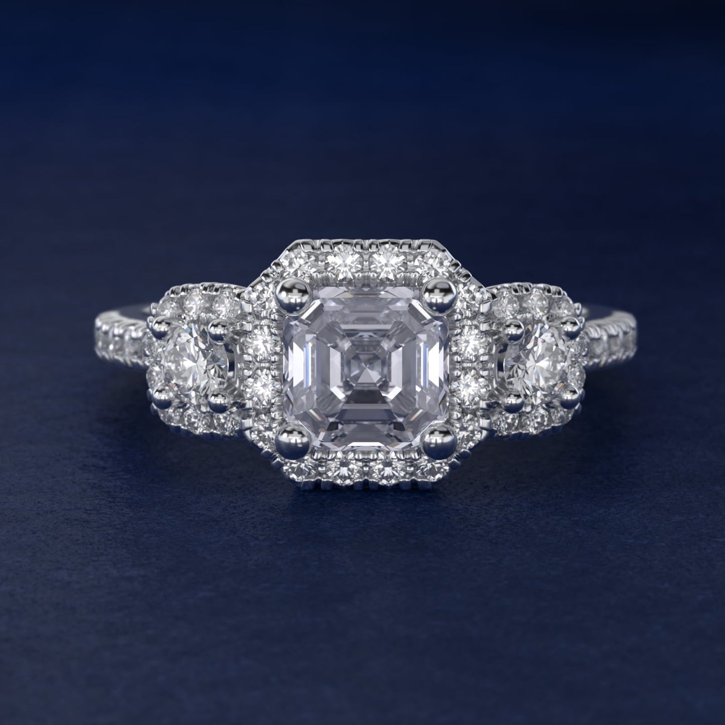 Three-Stone Cushion Halo Diamond Engagement Ring in Platinum - Asscher Center