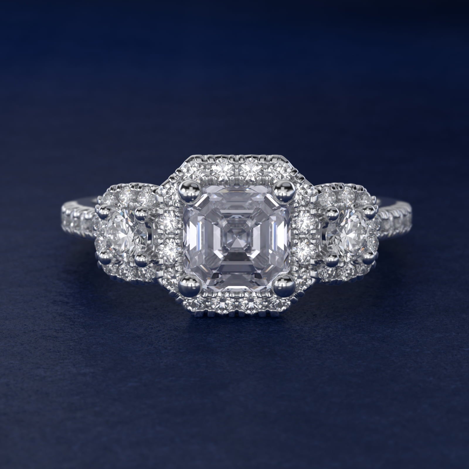 Three-Stone Cushion Halo Diamond Engagement Ring in Platinum - Asscher Center