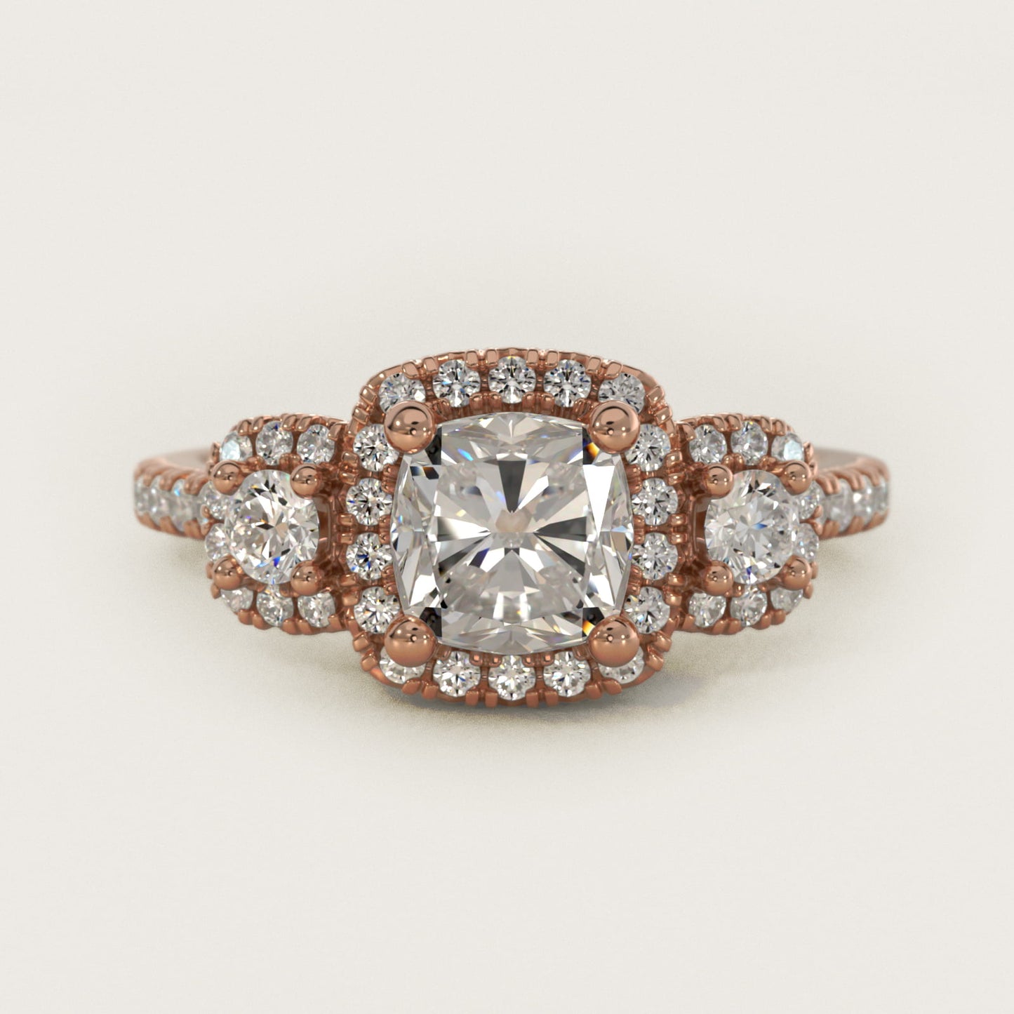 Three-Stone Cushion Halo Diamond Engagement Ring in 14k Rose Gold - Cushion Center