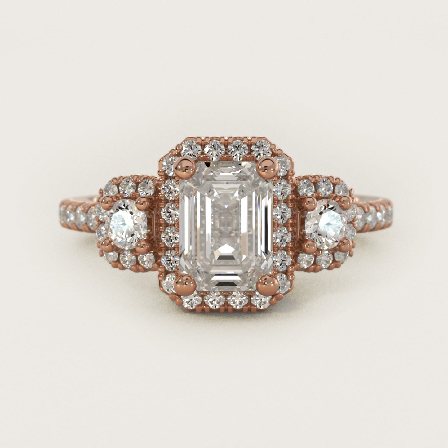 Three-Stone Cushion Halo Diamond Engagement Ring in 14k Rose Gold - Emerald Center