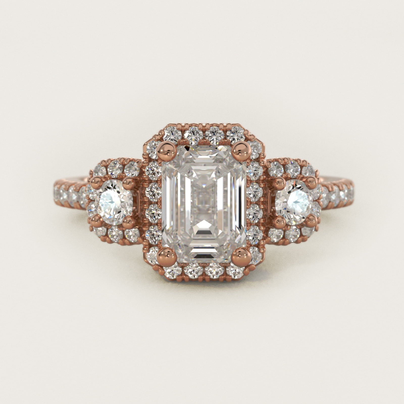 Three-Stone Cushion Halo Diamond Engagement Ring in 18k Rose Gold - Emerald Center