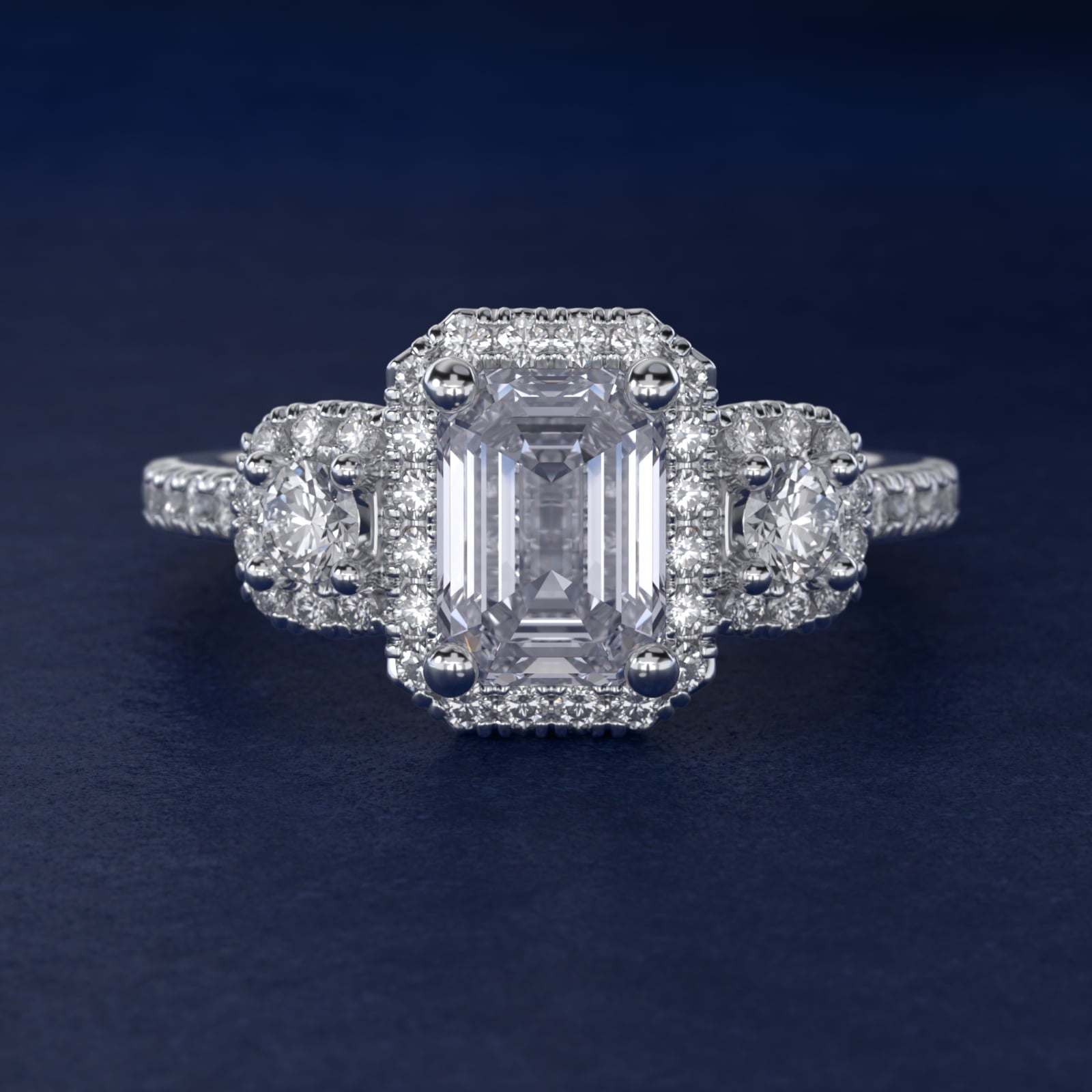 Three-Stone Cushion Halo Diamond Engagement Ring in Platinum - Emerald Center