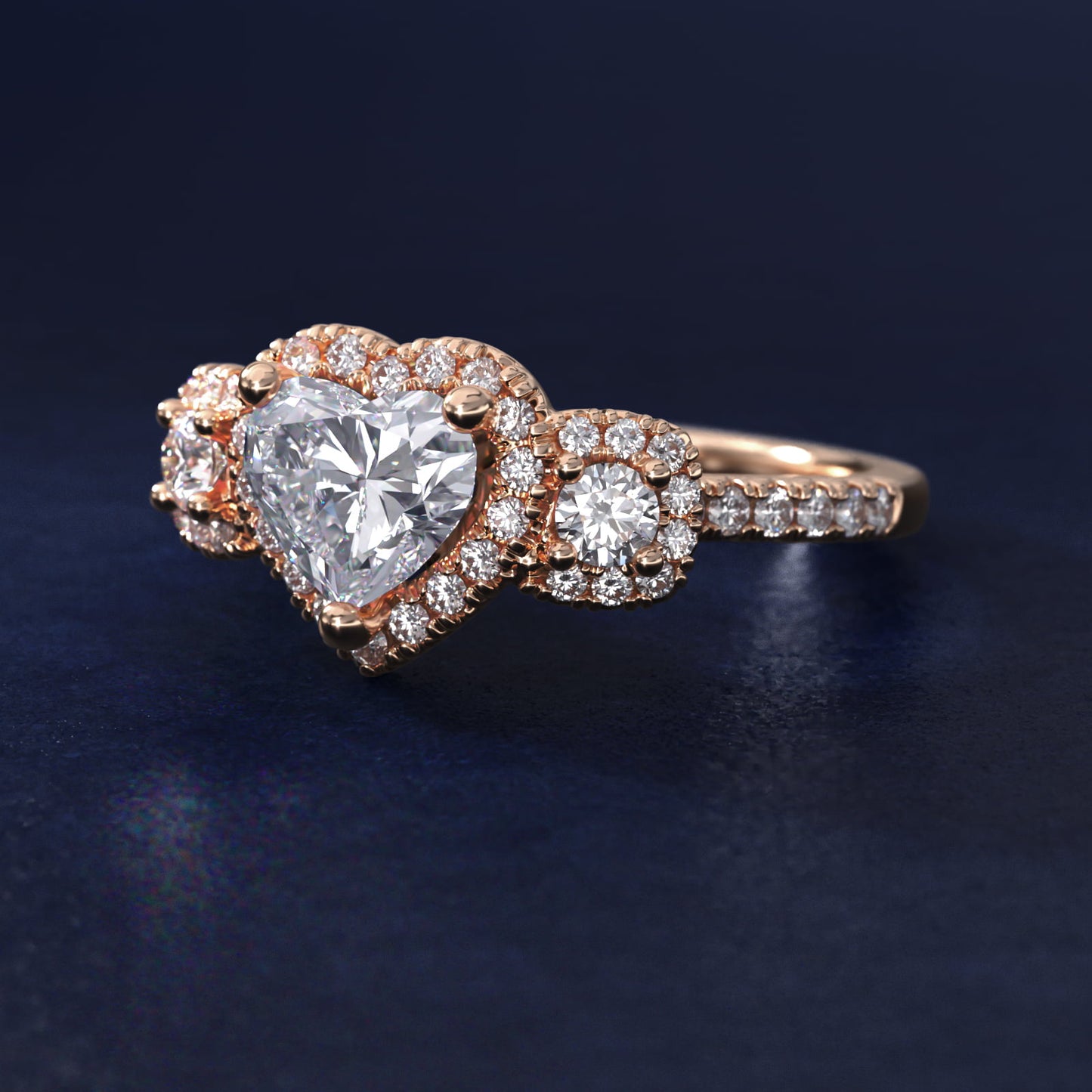Three-Stone Cushion Halo Diamond Engagement Ring in 14k Rose Gold - Heart Center