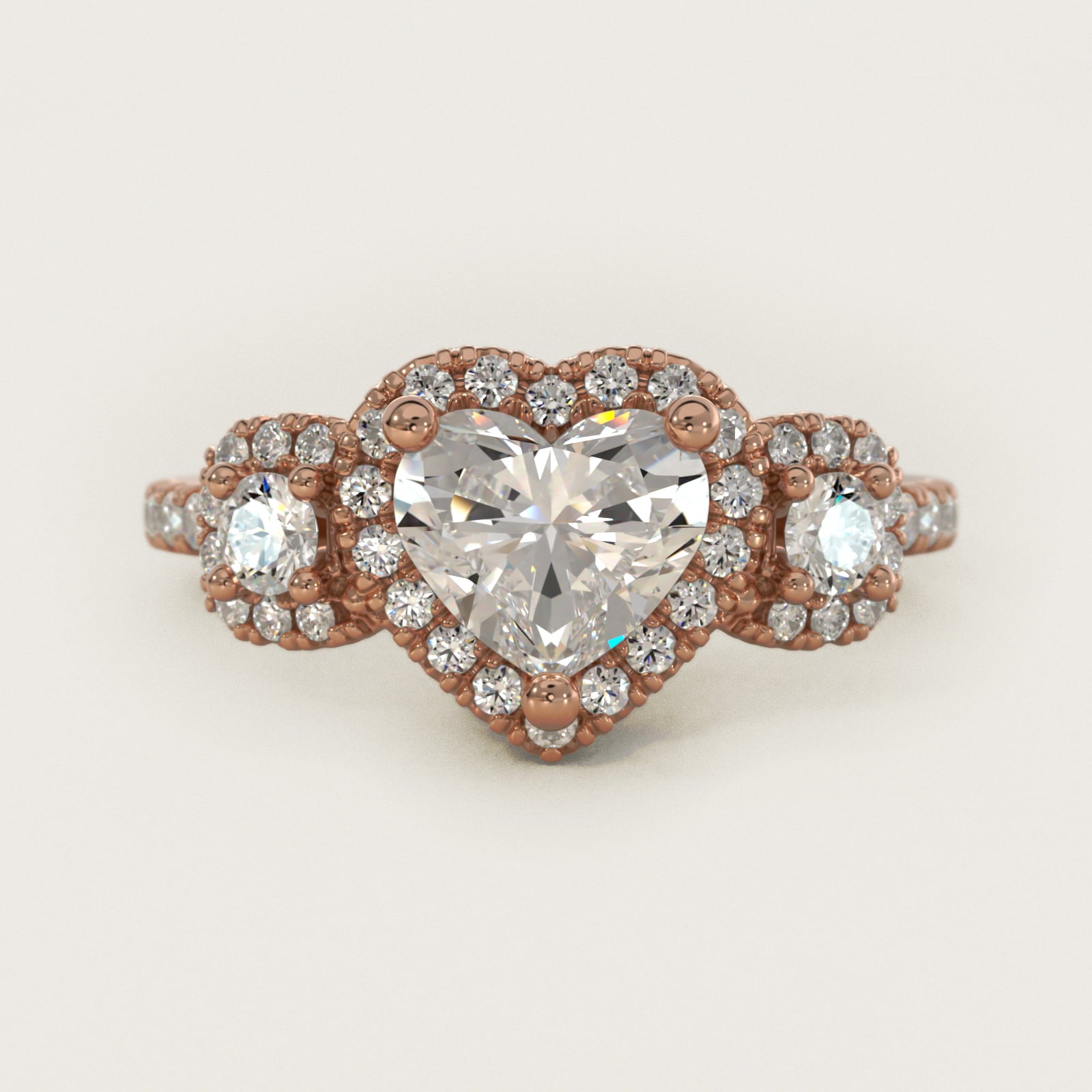 Three-Stone Cushion Halo Diamond Engagement Ring in 14k Rose Gold - Heart Center