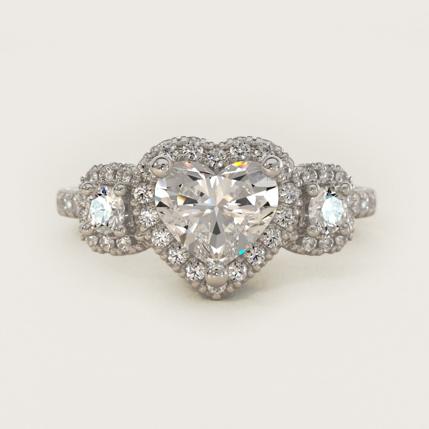 Three-Stone Cushion Halo Diamond Engagement Ring in 18k White Gold - Heart Center