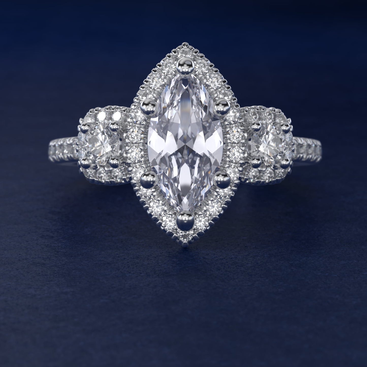 Three-Stone Cushion Halo Diamond Engagement Ring in Platinum - Marquise Center