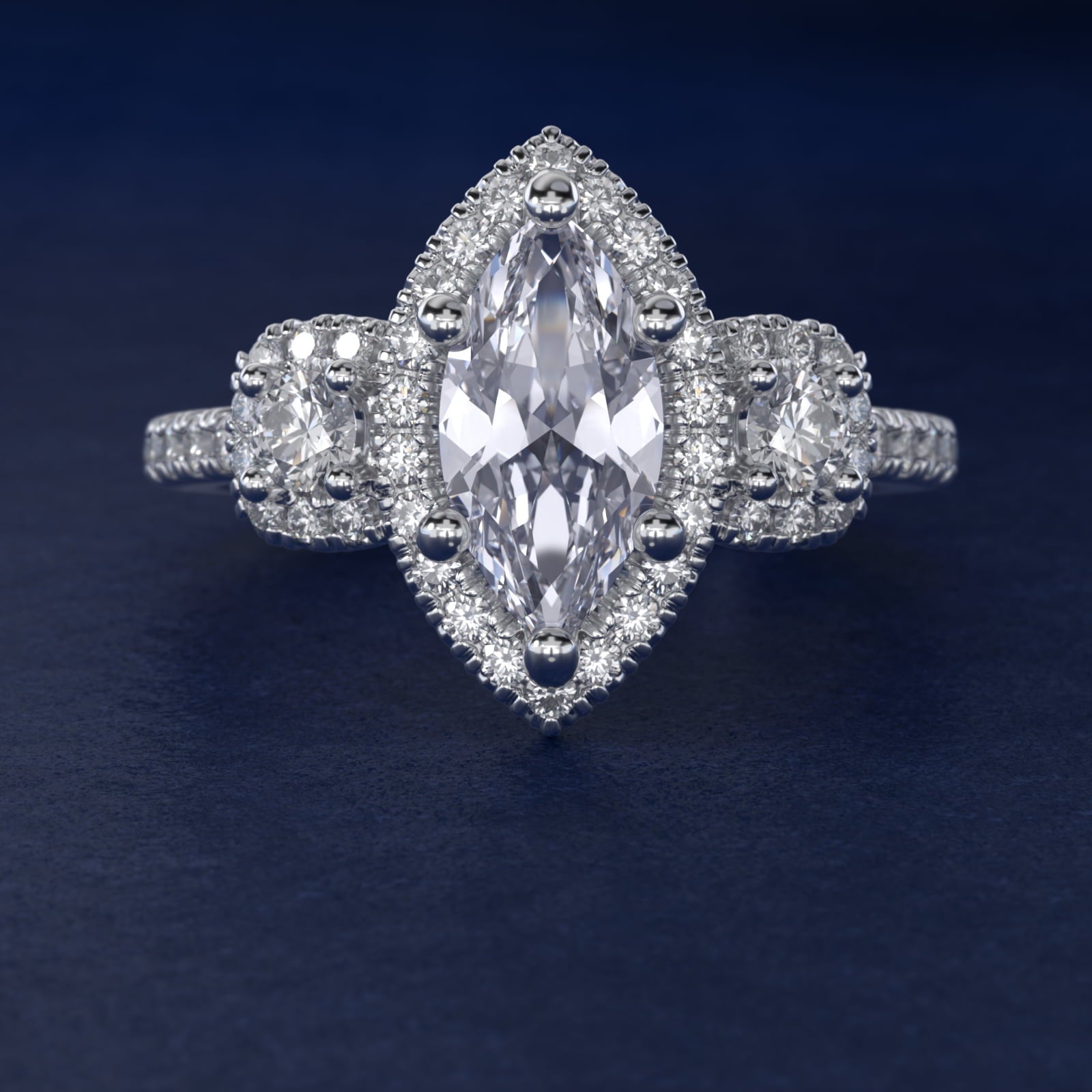 Three-Stone Cushion Halo Diamond Engagement Ring in Platinum - Marquise Center