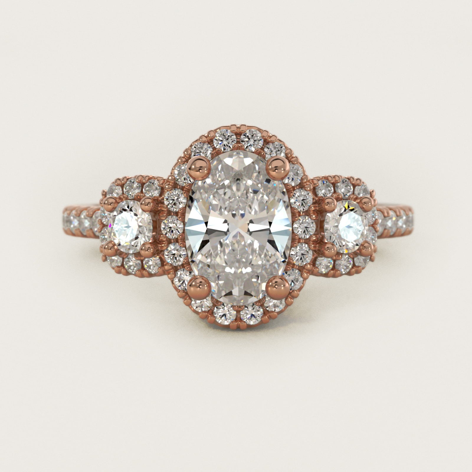 Three-Stone Cushion Halo Diamond Engagement Ring in 14k Rose Gold - Oval Center