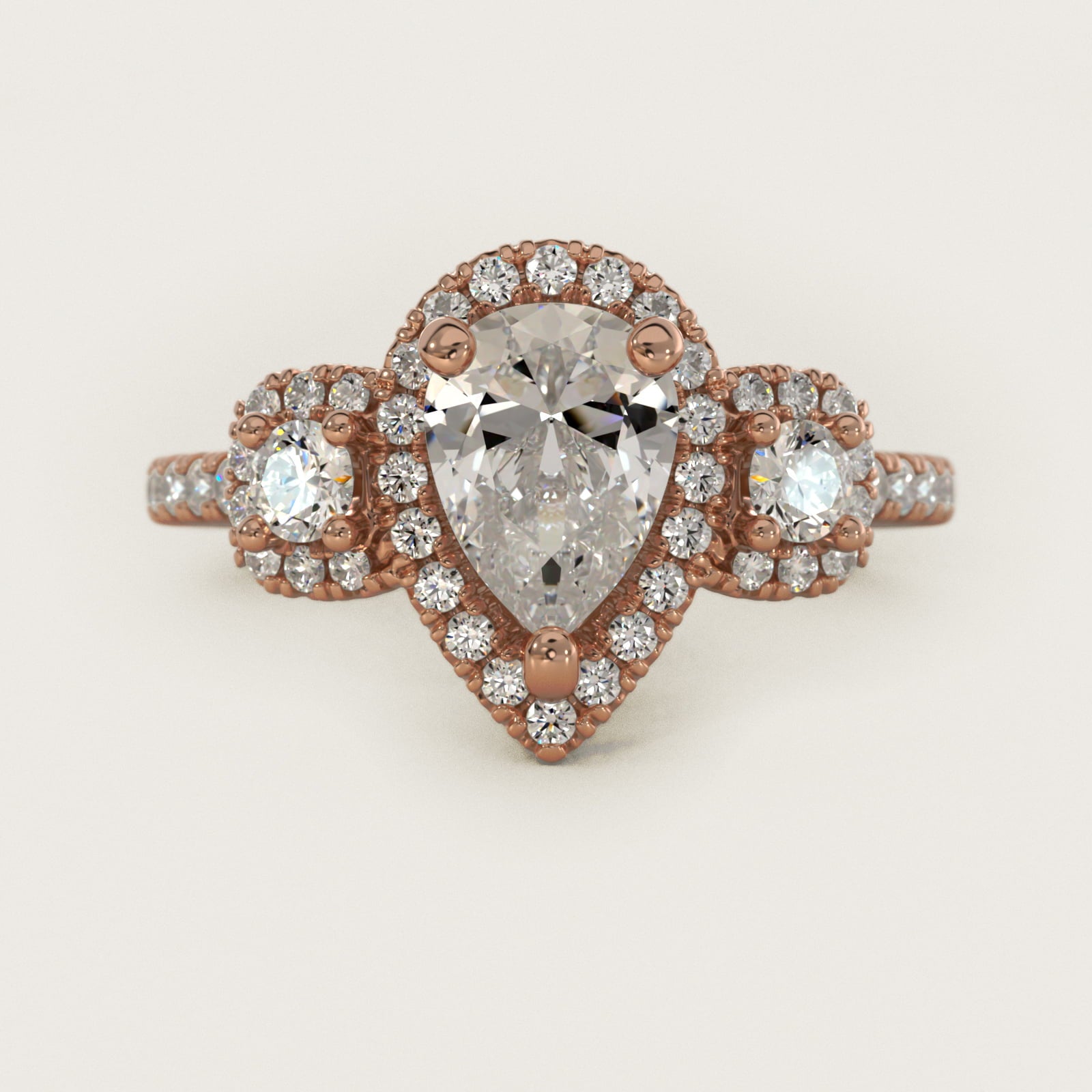 Three-Stone Cushion Halo Diamond Engagement Ring in 14k Rose Gold - Pear Center