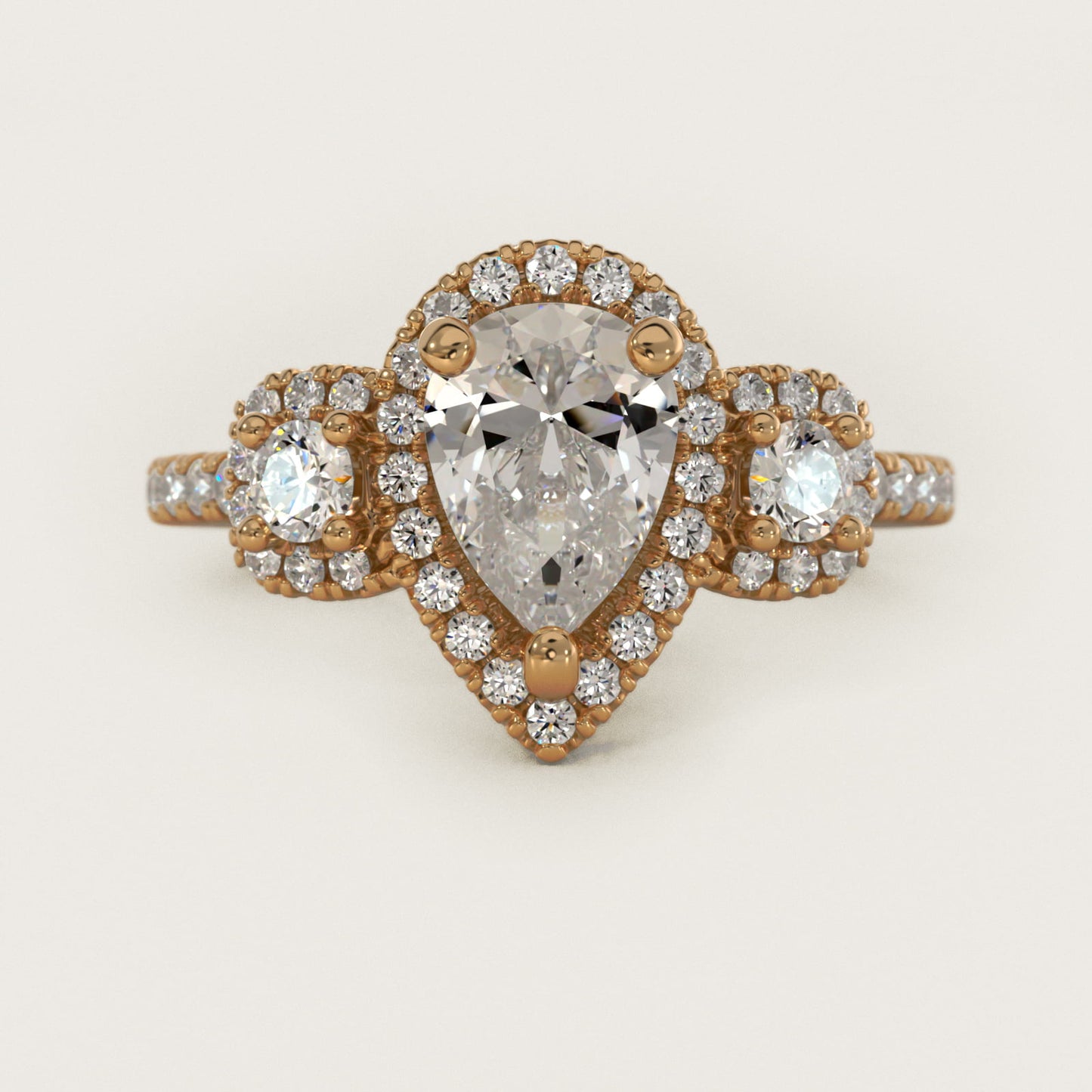 Three-Stone Cushion Halo Diamond Engagement Ring in 14k Yellow Gold - Pear Center
