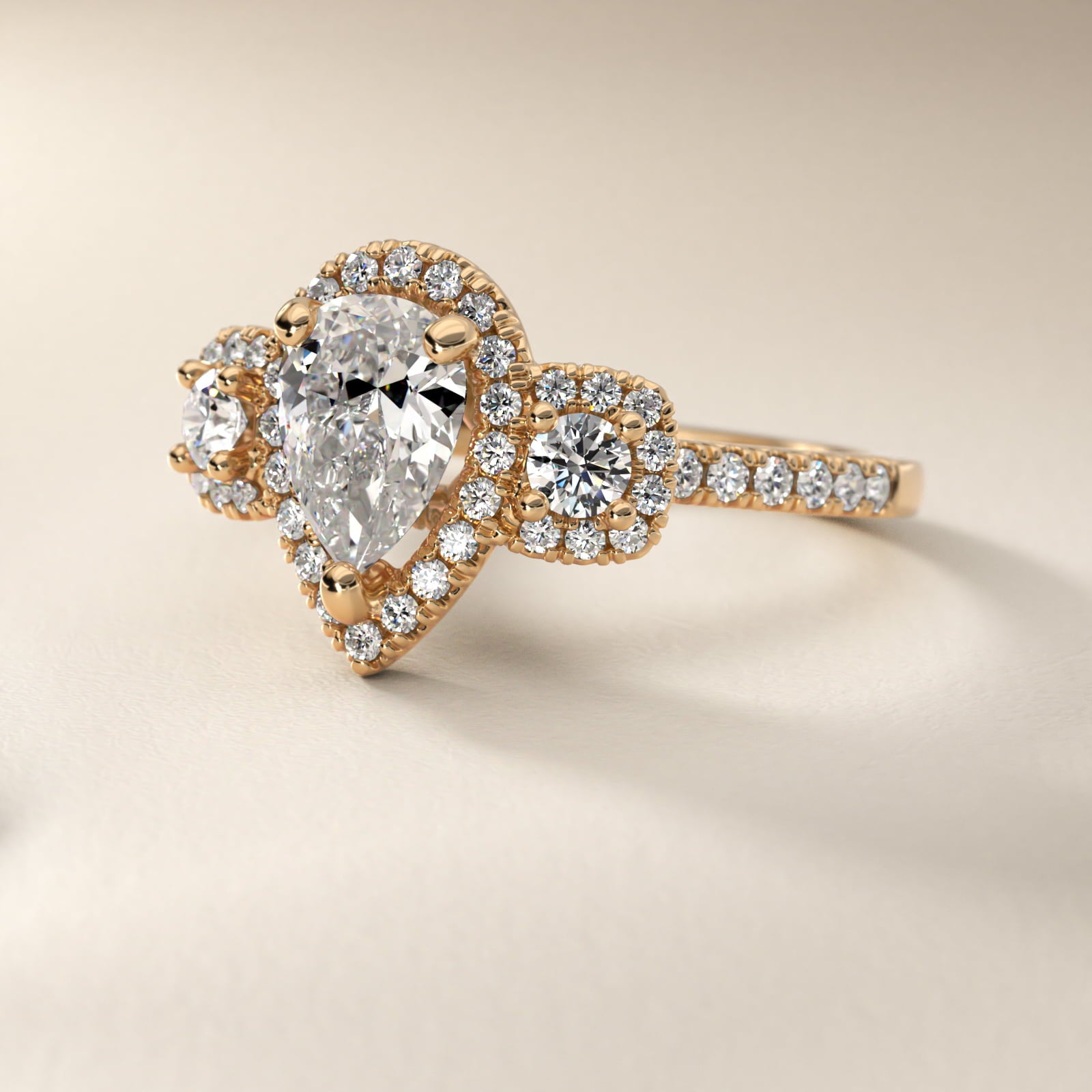 Three-Stone Cushion Halo Diamond Engagement Ring in 14k Yellow Gold - Pear Center