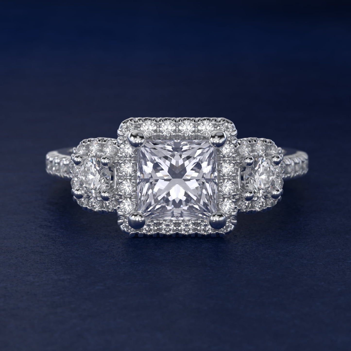 Three-Stone Cushion Halo Diamond Engagement Ring in Platinum - Princess Center