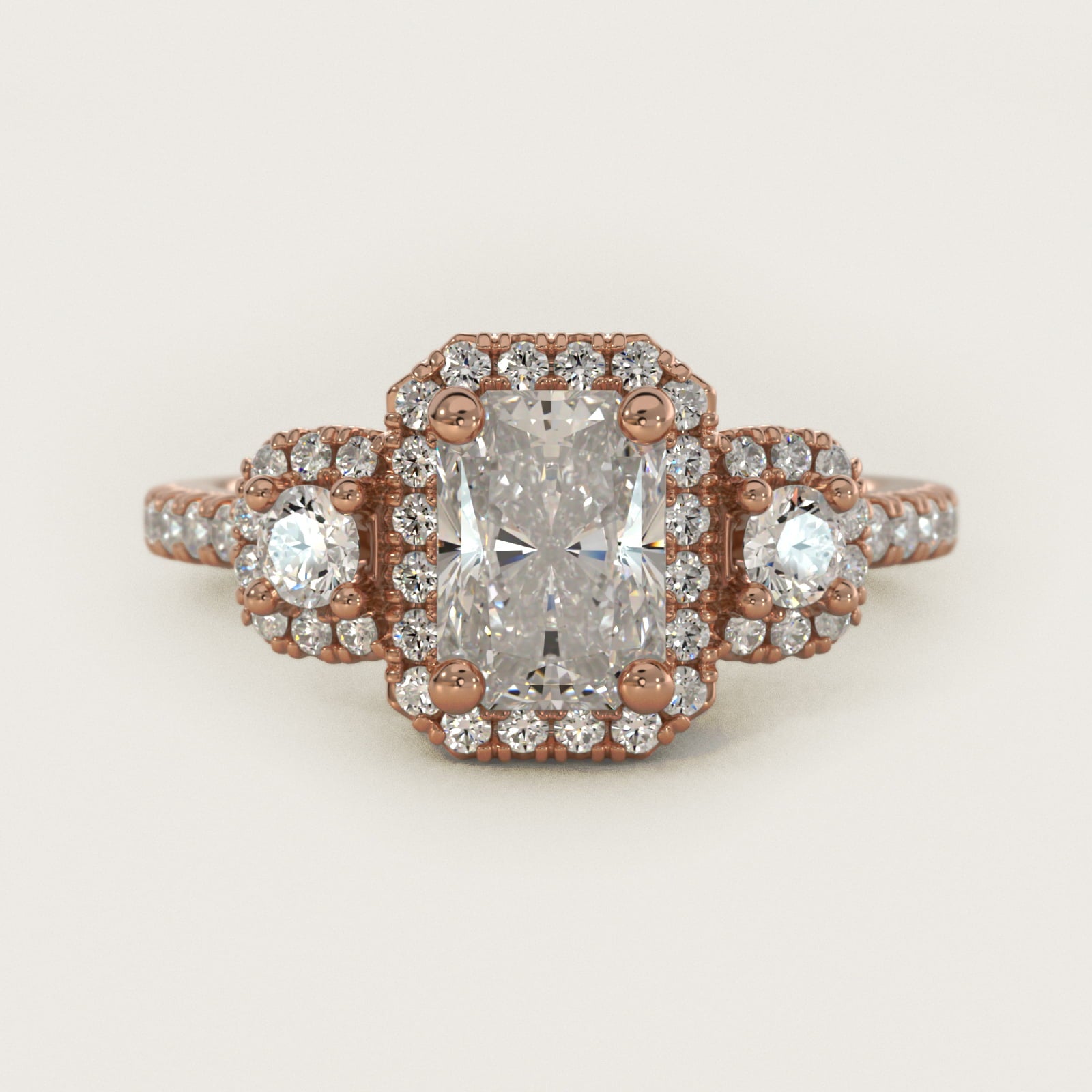 Three-Stone Cushion Halo Diamond Engagement Ring in 18k Rose Gold - Radiant Center