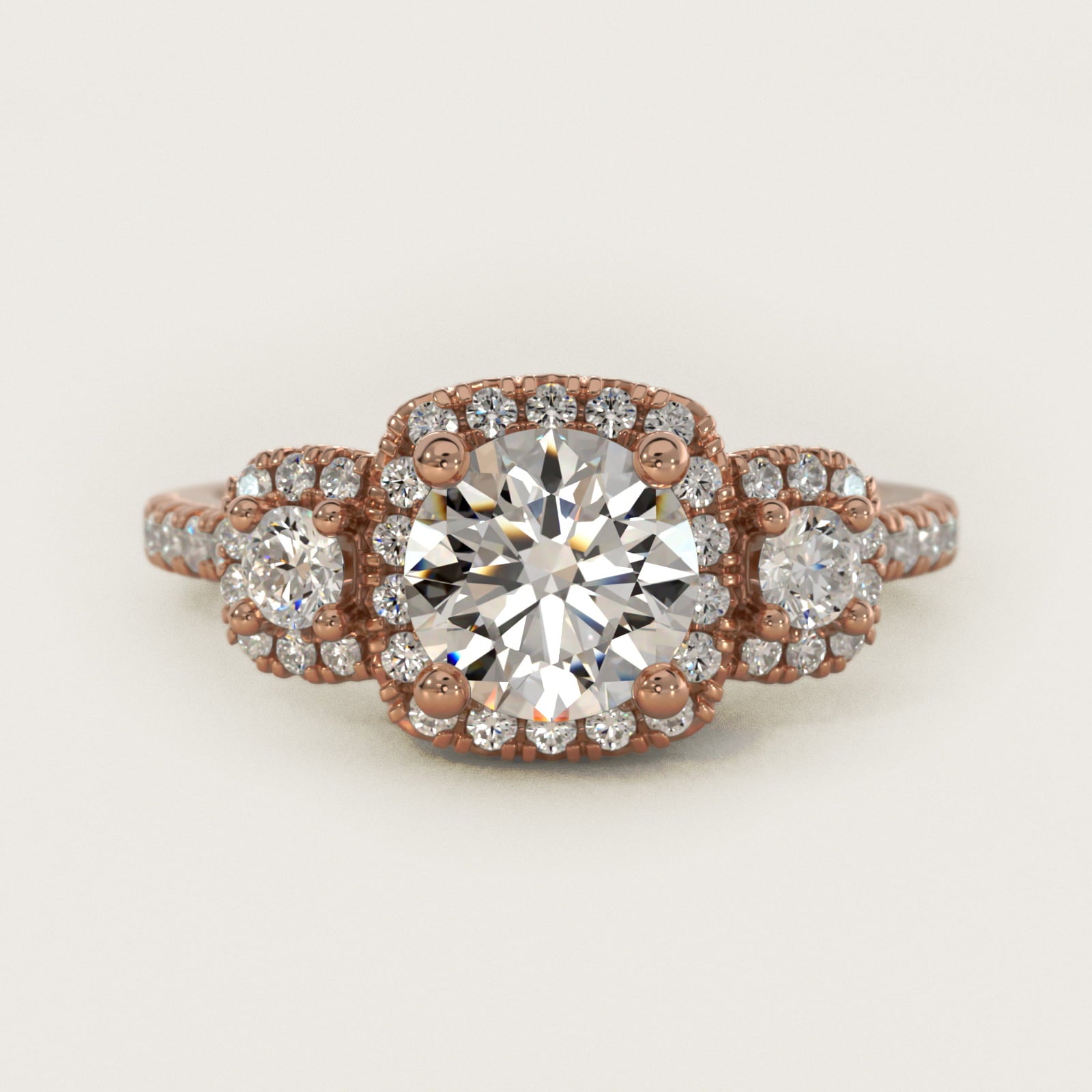Three-Stone Cushion Halo Diamond Engagement Ring in 18k Rose Gold - Round Center