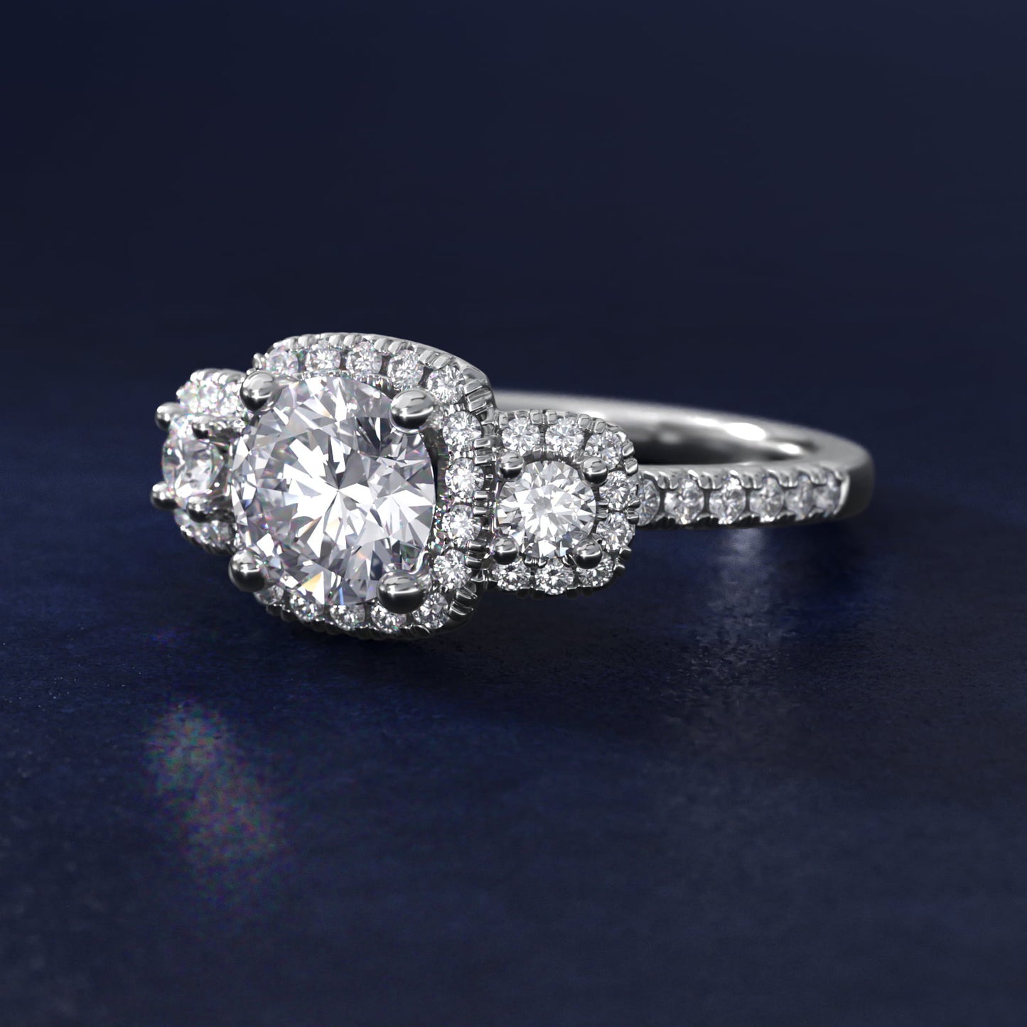 Three-Stone Cushion Halo Diamond Engagement Ring in 18k White Gold - Round Center