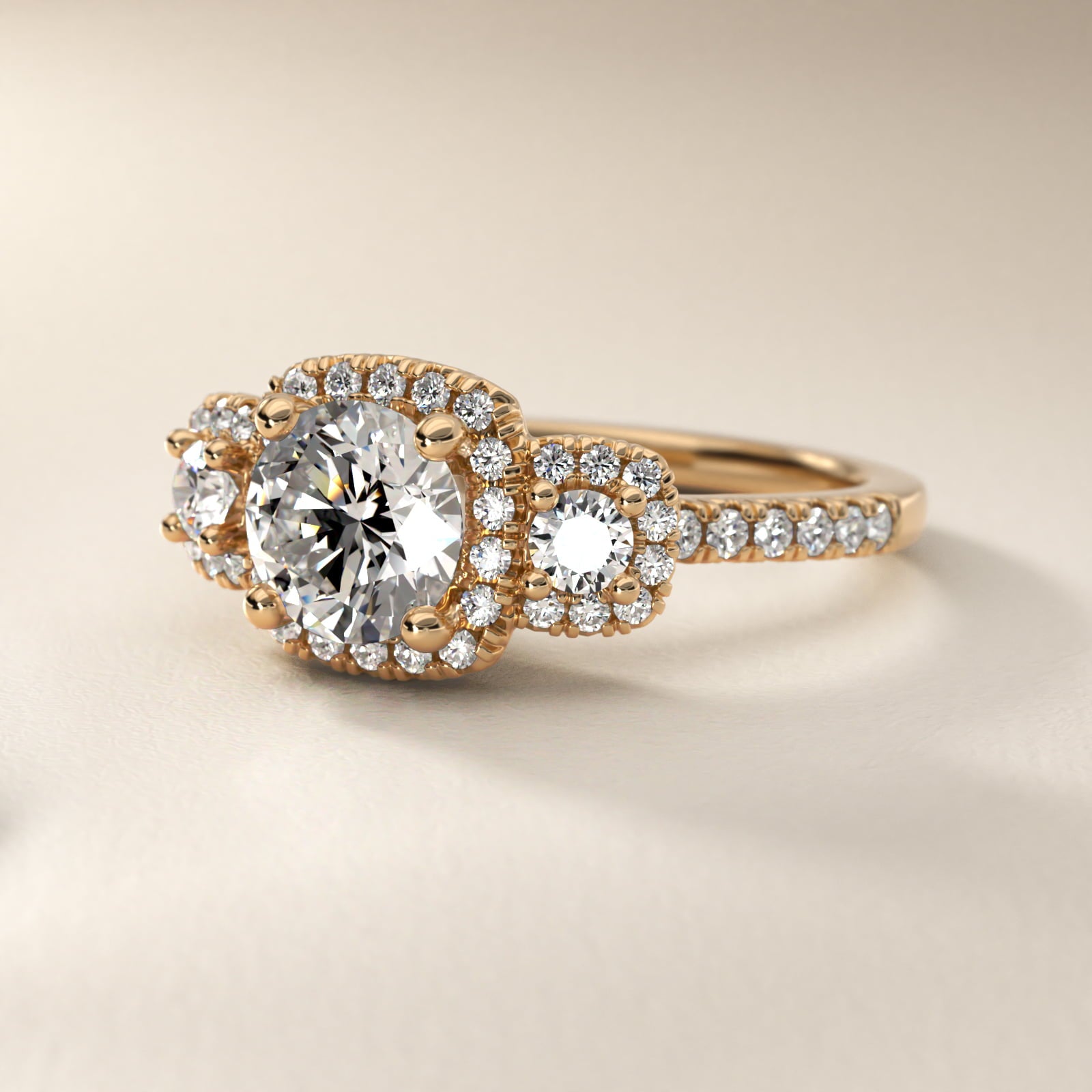 Three-Stone Cushion Halo Diamond Engagement Ring in 18k Yellow Gold - Round Center