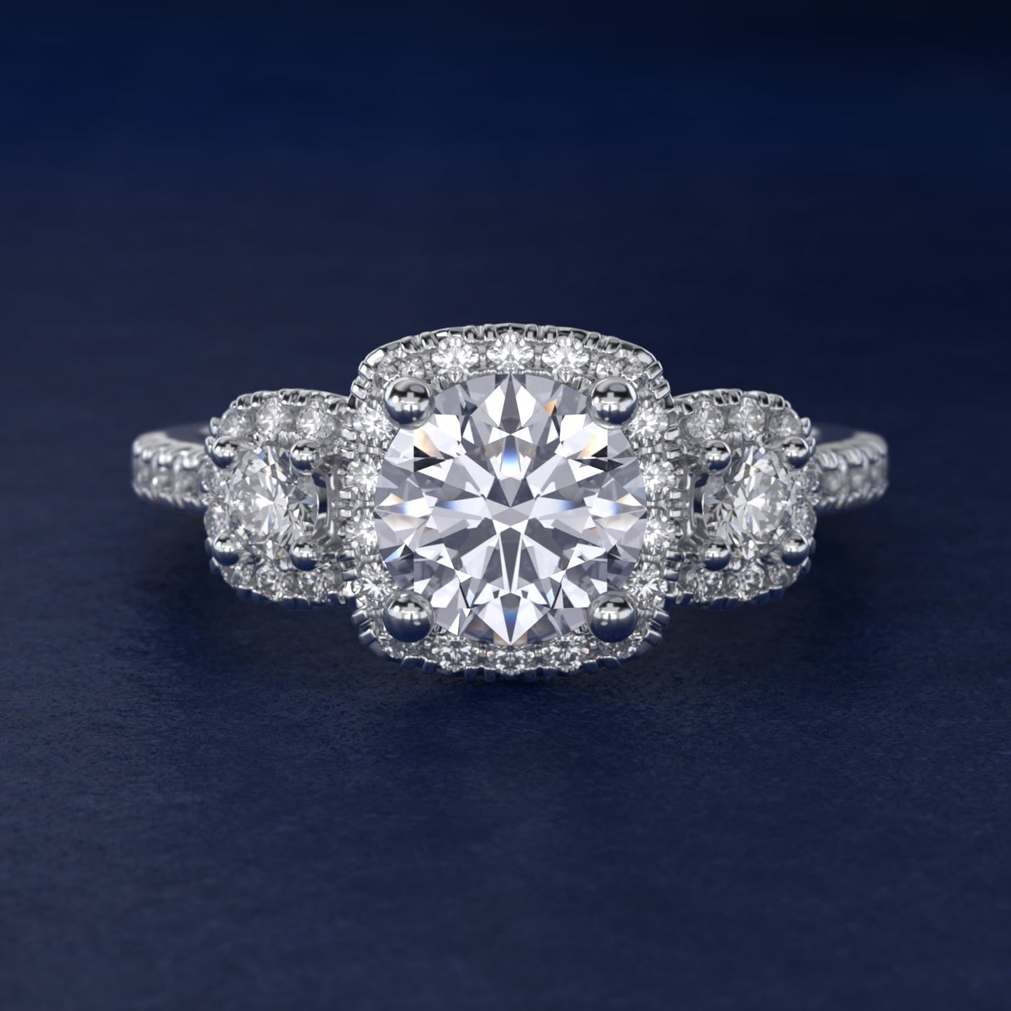 Three-Stone Cushion Halo Diamond Engagement Ring in Platinum - Round Center