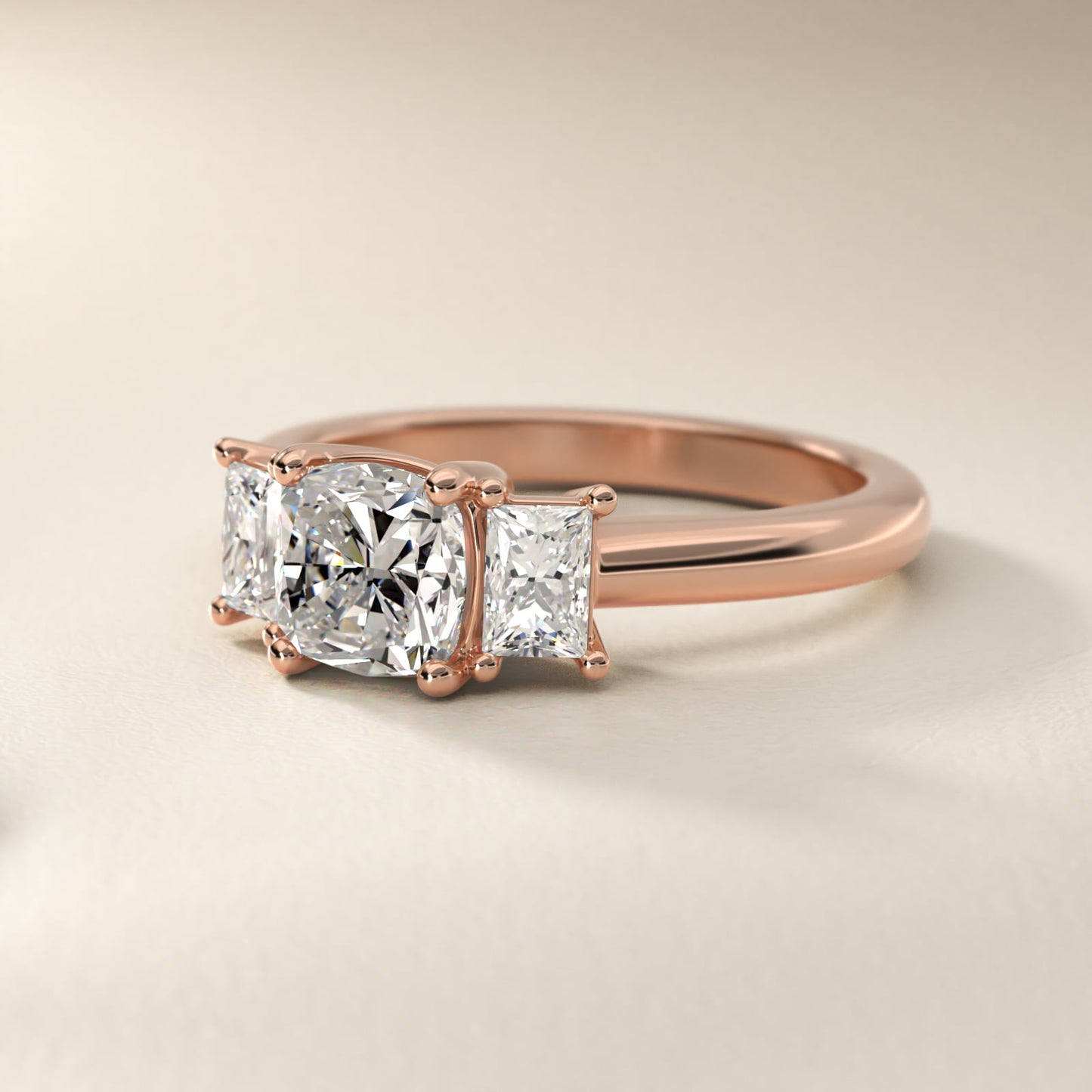 Three-Stone Elongated Princess Diamond Engagement Ring in 14k Rose Gold (1/2 ct. tw.) - Cushion Center