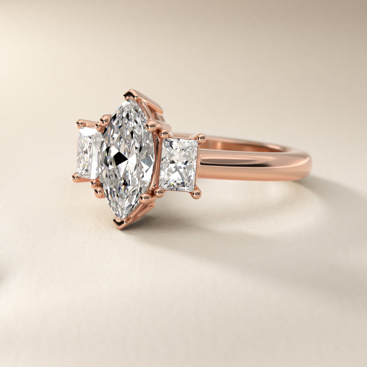 Three-Stone Elongated Princess Diamond Engagement Ring in 18k Rose Gold (1/2 ct. tw.) - Marquise Center