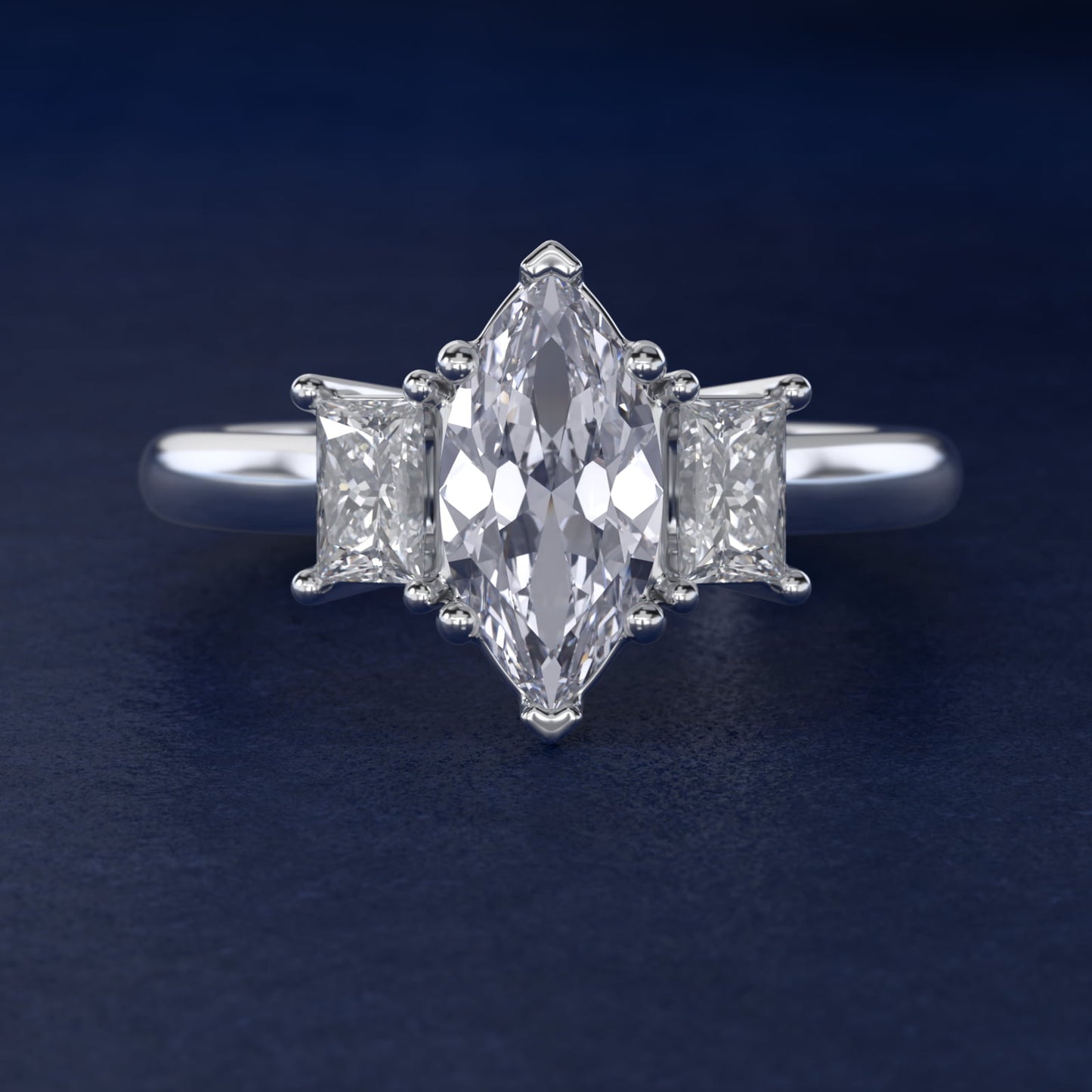 Three-Stone Elongated Princess Diamond Engagement Ring in Platinum (1/2 ct. tw.) - Marquise Center