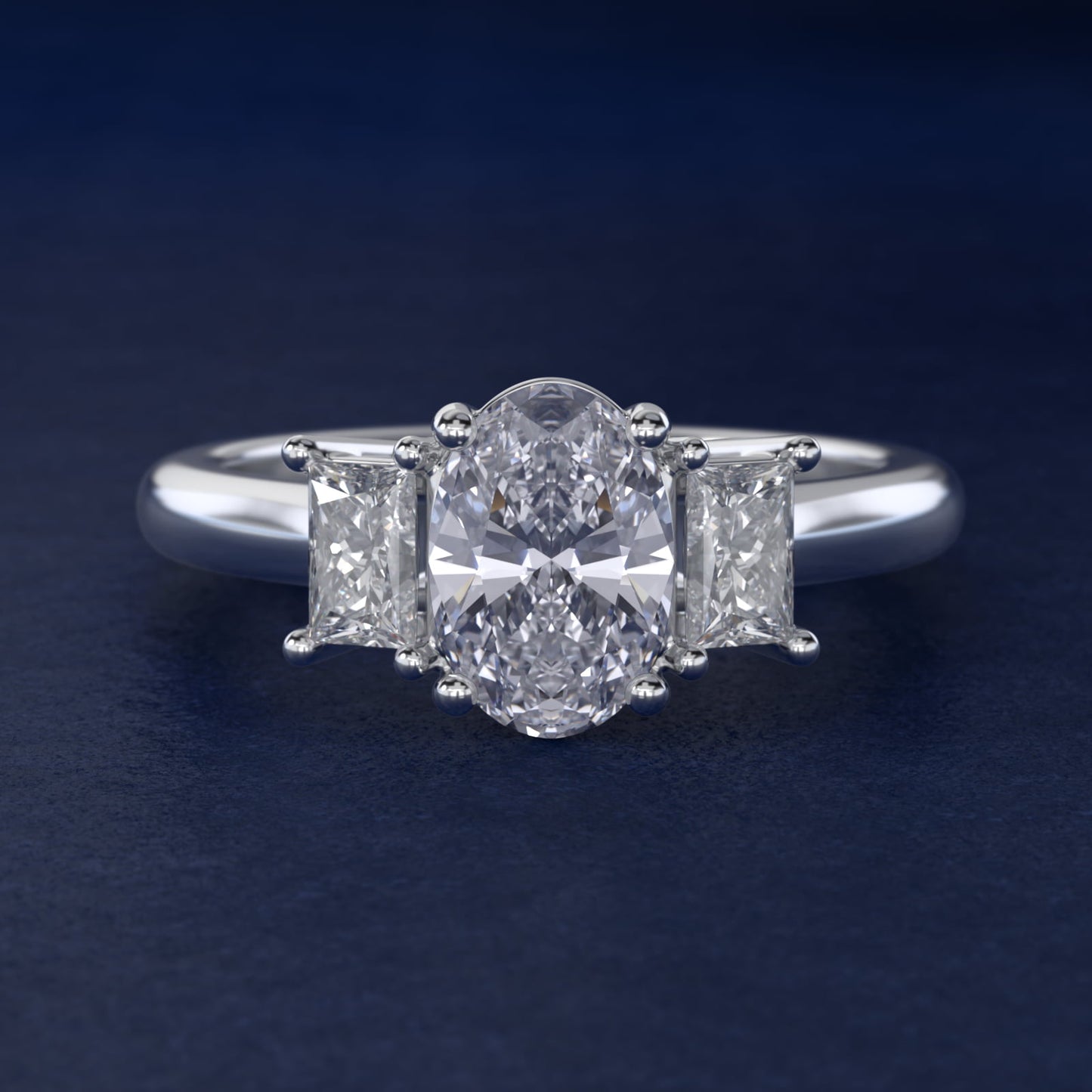 Three-Stone Elongated Princess Diamond Engagement Ring in Platinum (1/2 ct. tw.) - Oval Center