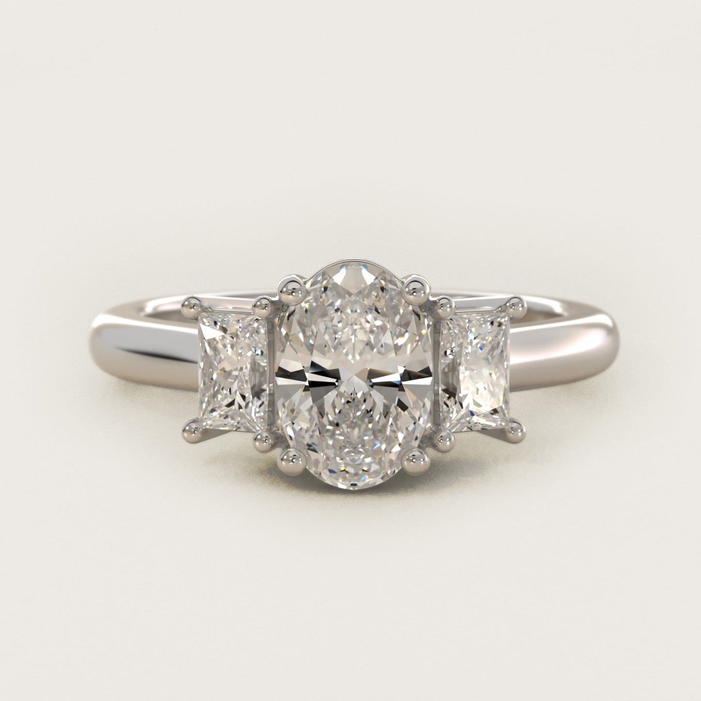 Three-Stone Elongated Princess Diamond Engagement Ring in Platinum (1/2 ct. tw.) - Oval Center