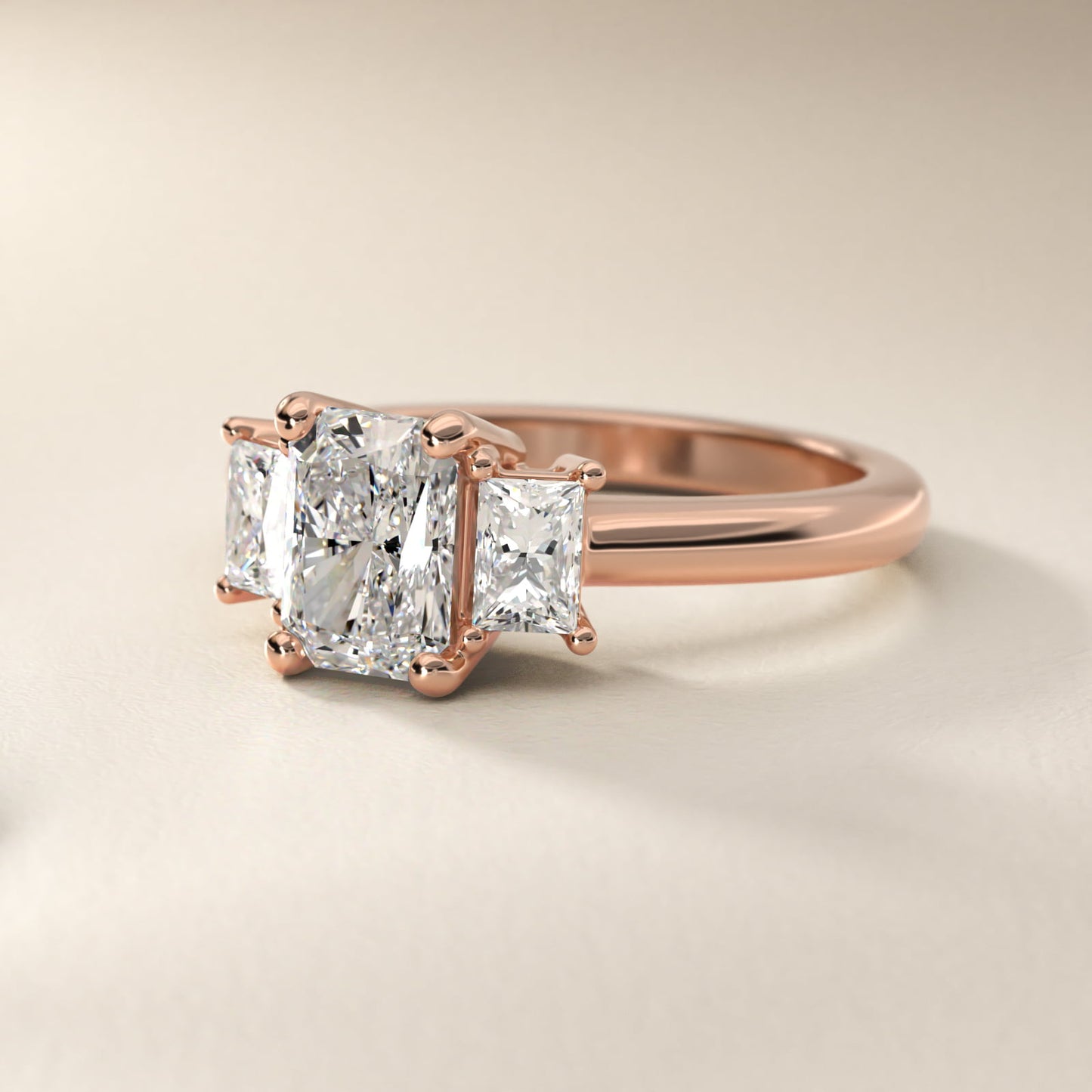 Three-Stone Elongated Princess Diamond Engagement Ring in 18k Rose Gold (1/2 ct. tw.) - Radiant Center