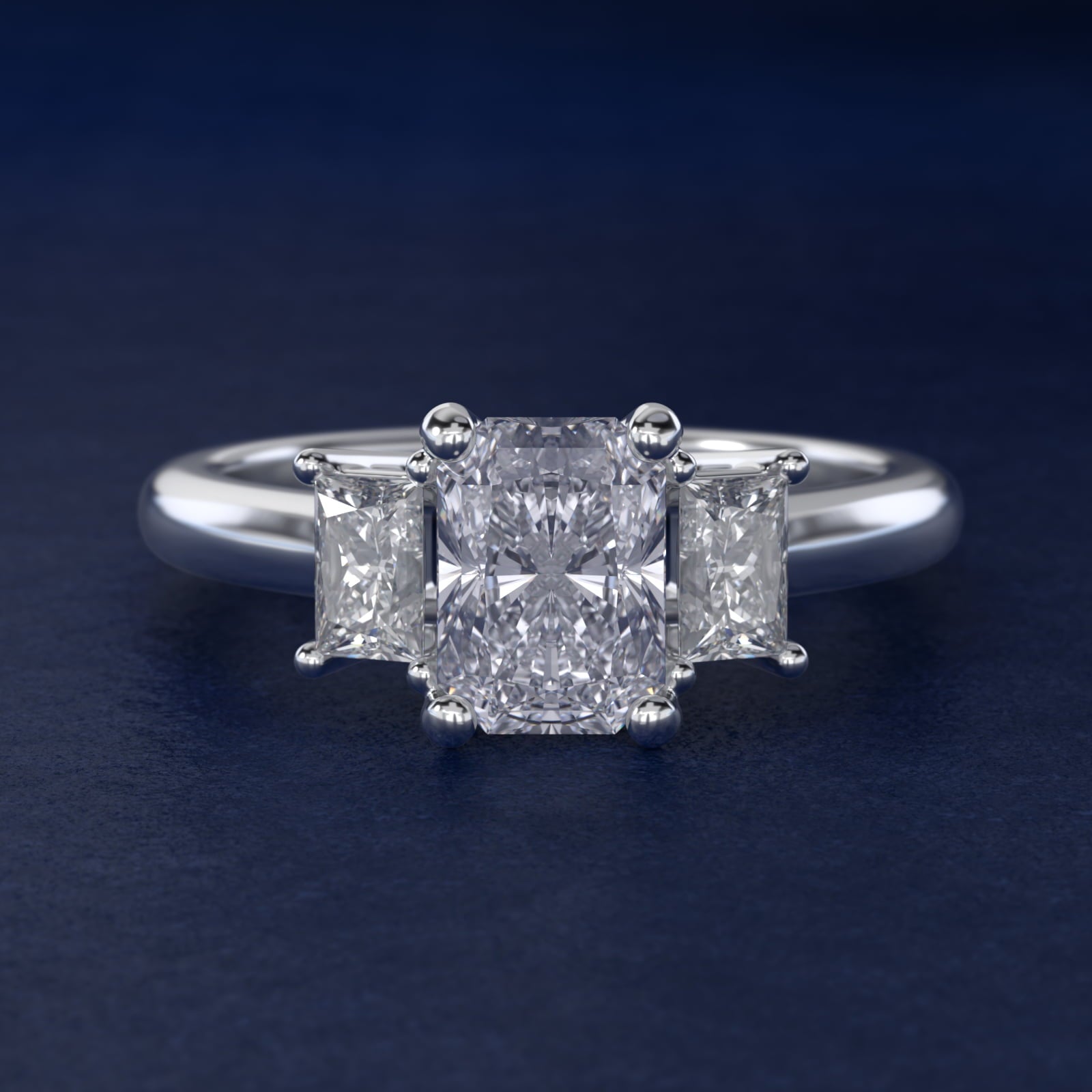 Three-Stone Elongated Princess Diamond Engagement Ring in Platinum (1/2 ct. tw.) - Radiant Center