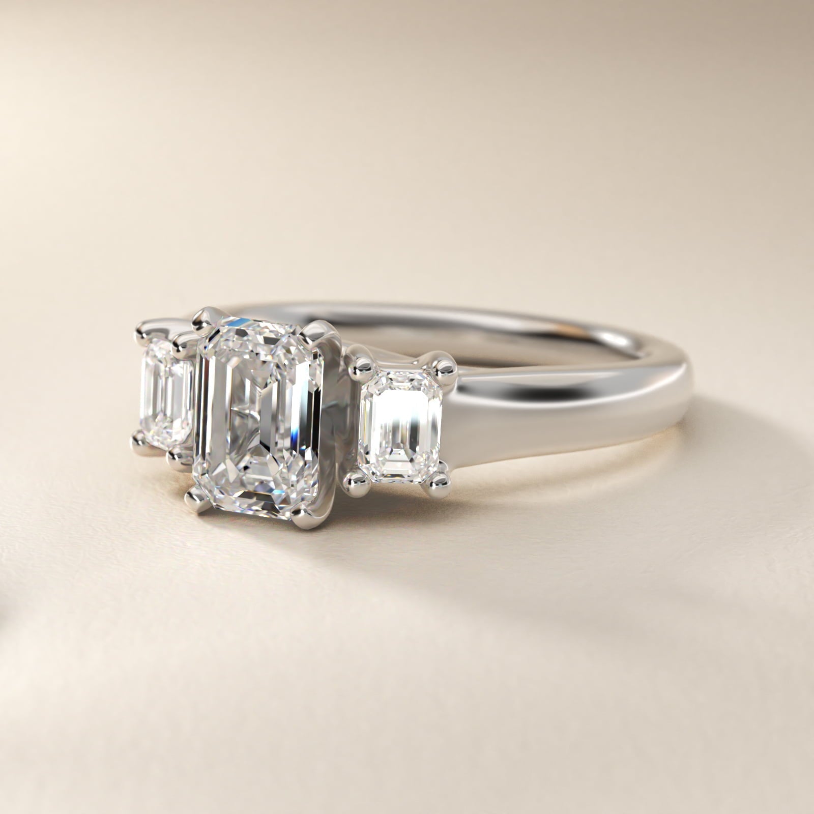 Three-Stone Emerald-Cut Diamond Engagement Ring in Platinum (1/3 ct tw.) By Zac Zac Posen - Emerald Center