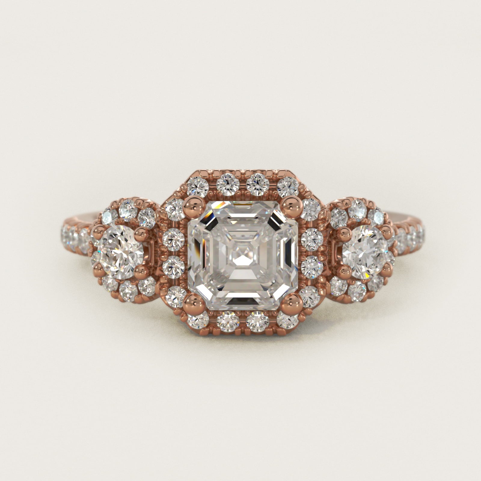 Three-Stone Halo Diamond Engagement Ring in 18k Rose Gold - Asscher Center