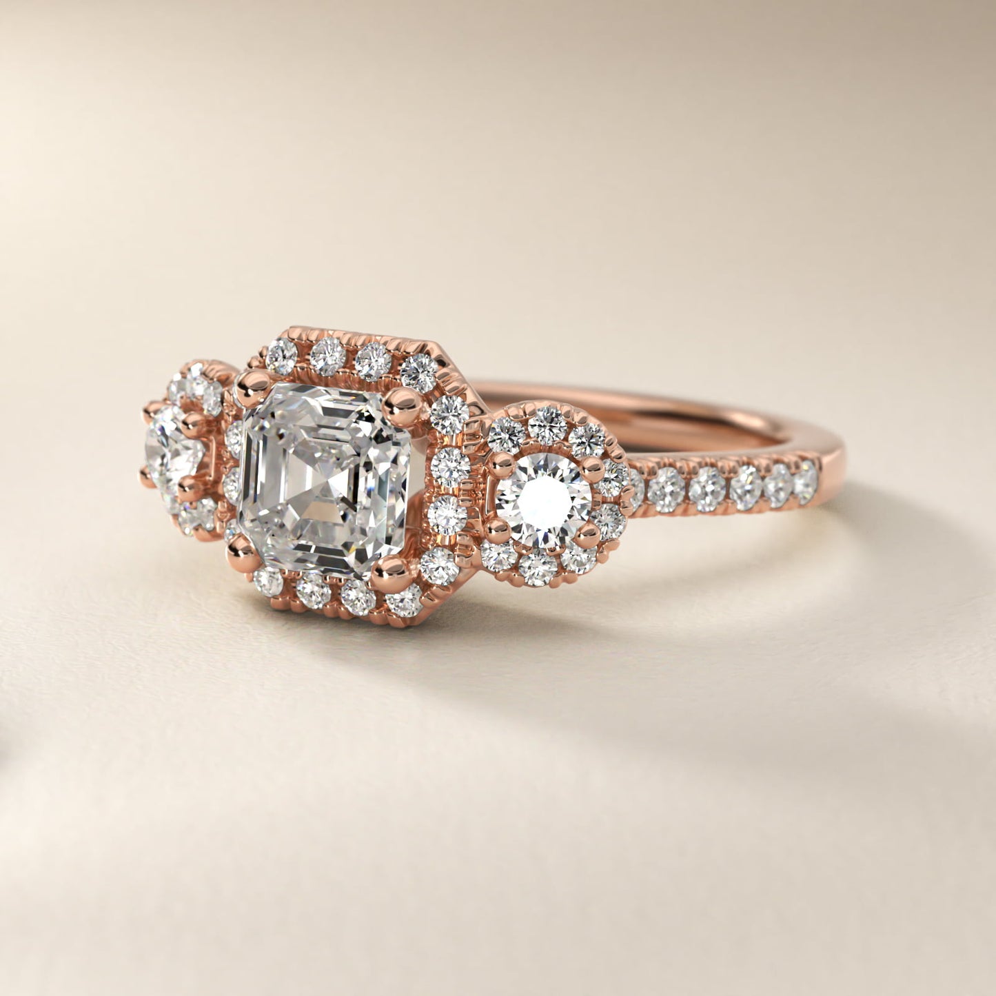 Three-Stone Halo Diamond Engagement Ring in 18k Rose Gold - Asscher Center