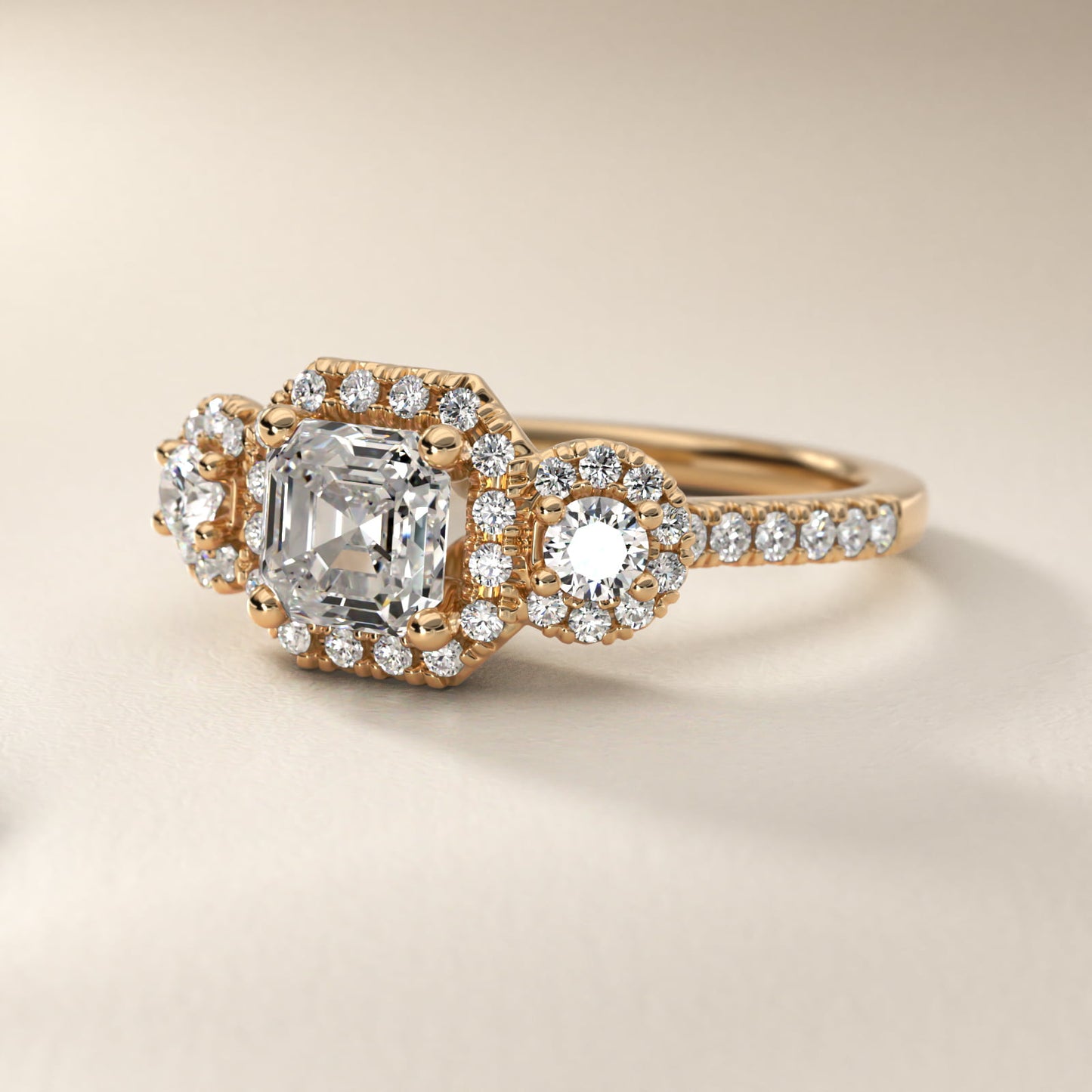 Three-Stone Halo Diamond Engagement Ring in 14k Yellow Gold - Asscher Center