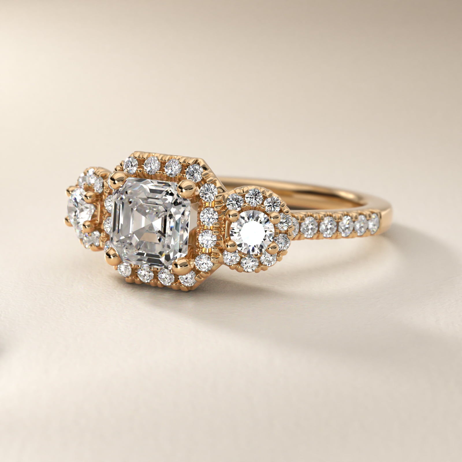 Three-Stone Halo Diamond Engagement Ring in 18k Yellow Gold - Asscher Center