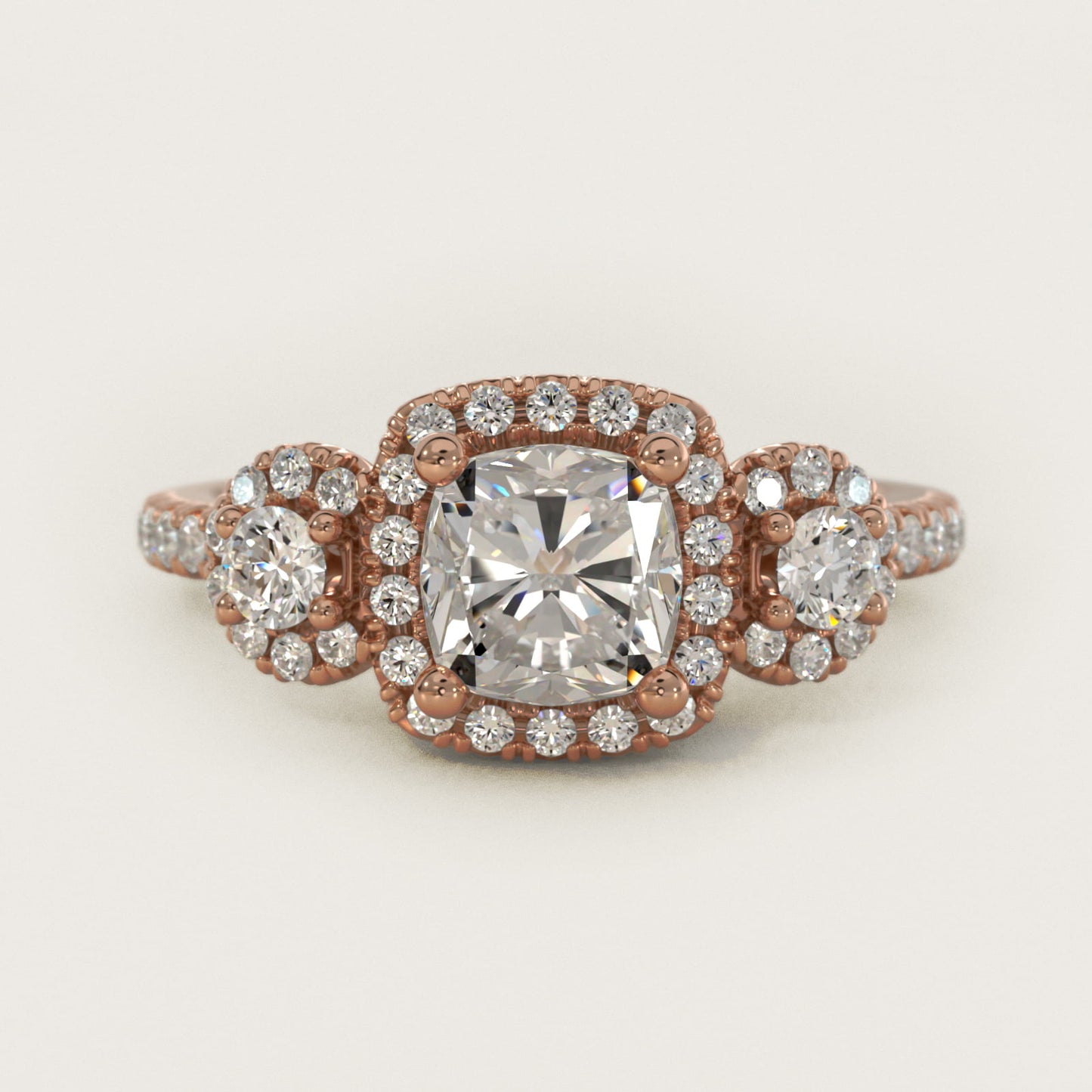 Three-Stone Halo Diamond Engagement Ring in 18k Rose Gold - Cushion Center