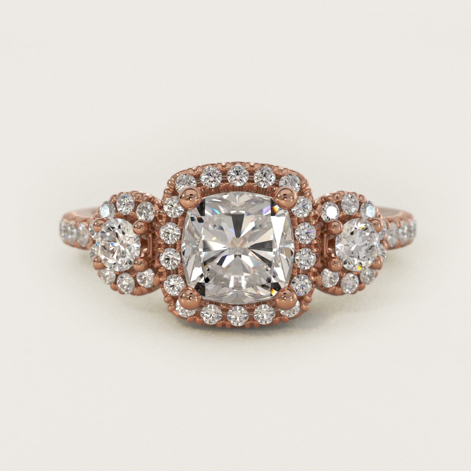 Three-Stone Halo Diamond Engagement Ring in 18k Rose Gold - Cushion Center
