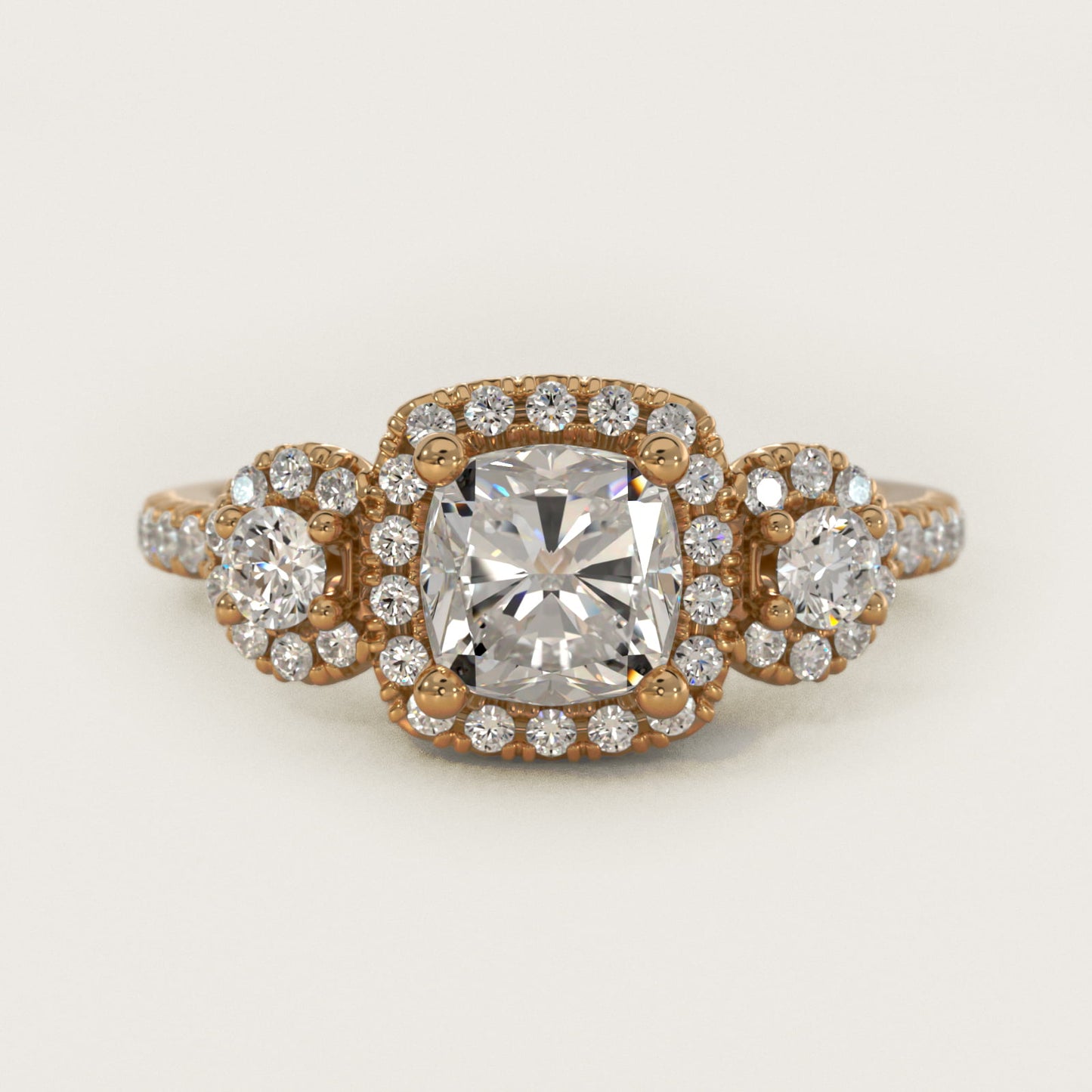 Three-Stone Halo Diamond Engagement Ring in 18k Yellow Gold - Cushion Center