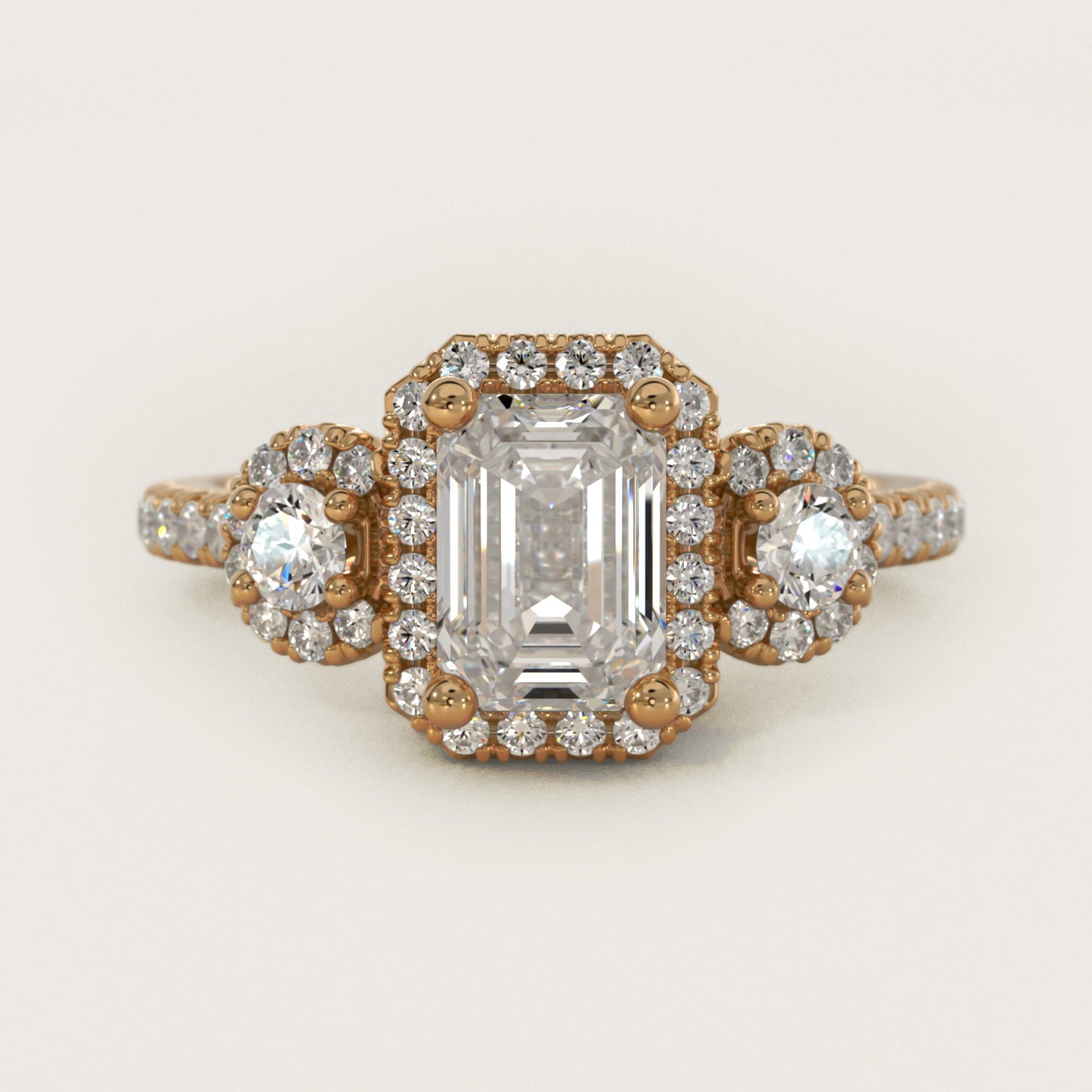 Three-Stone Halo Diamond Engagement Ring in 18k Yellow Gold - Emerald Center