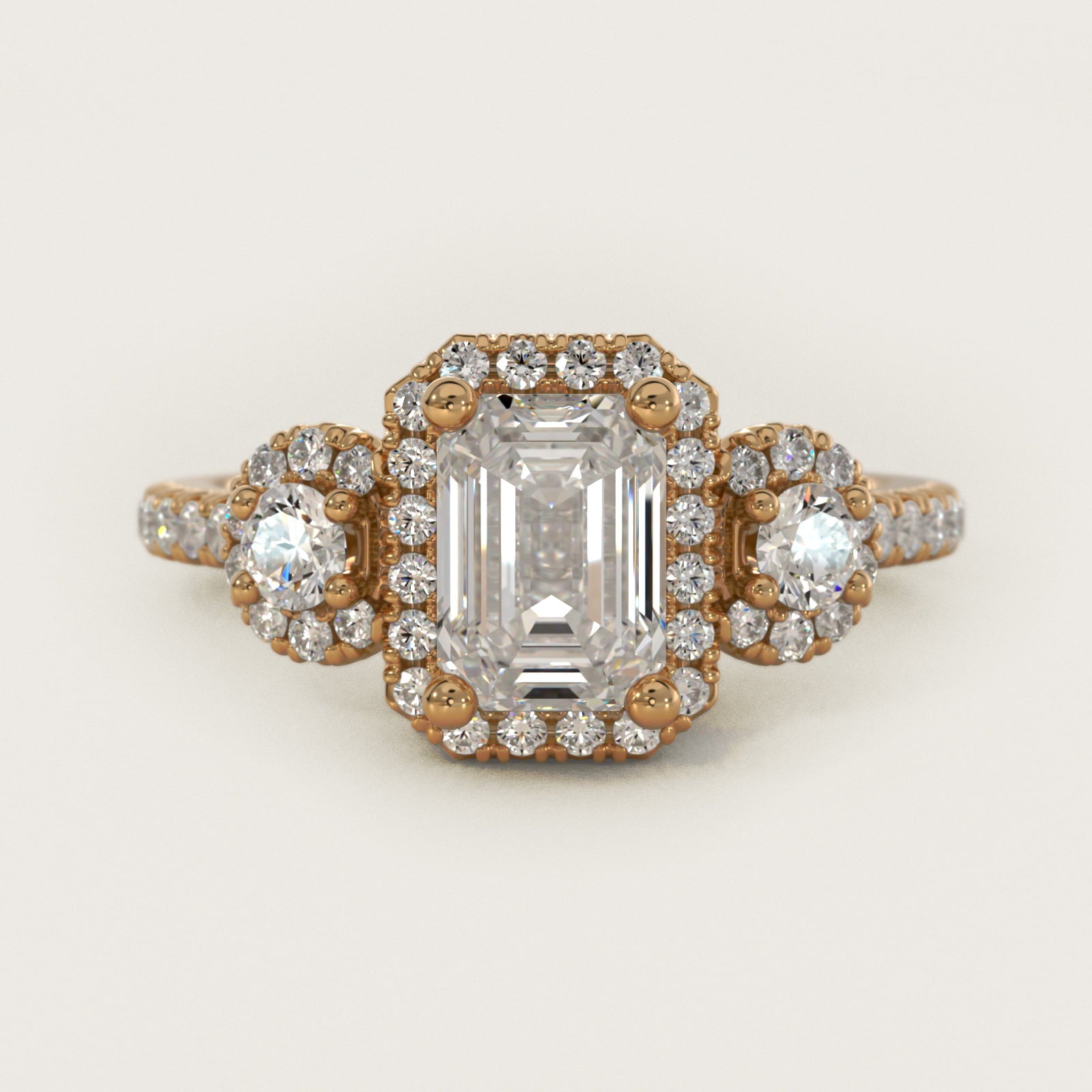 Three-Stone Halo Diamond Engagement Ring in 18k Yellow Gold - Emerald Center