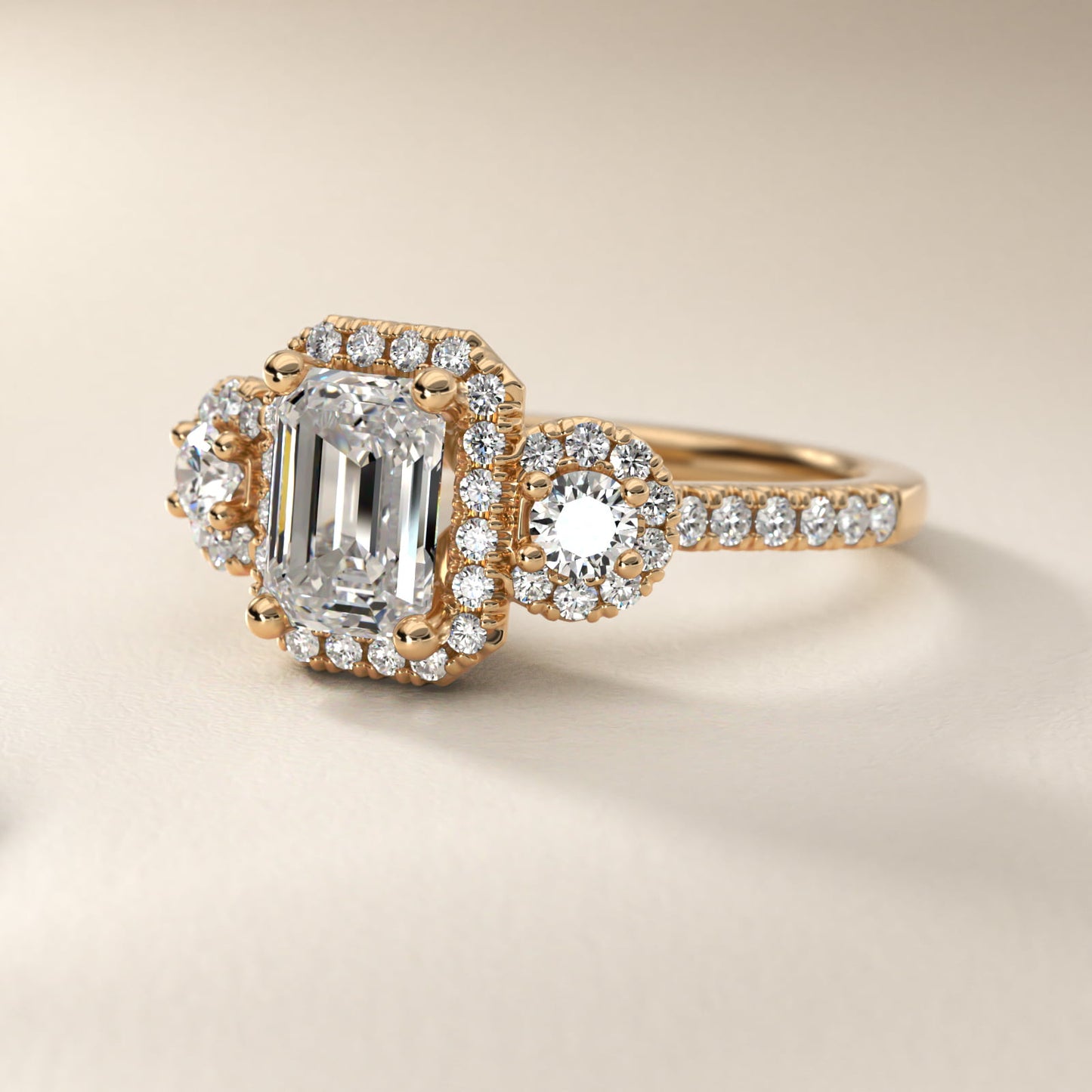Three-Stone Halo Diamond Engagement Ring in 18k Yellow Gold - Emerald Center