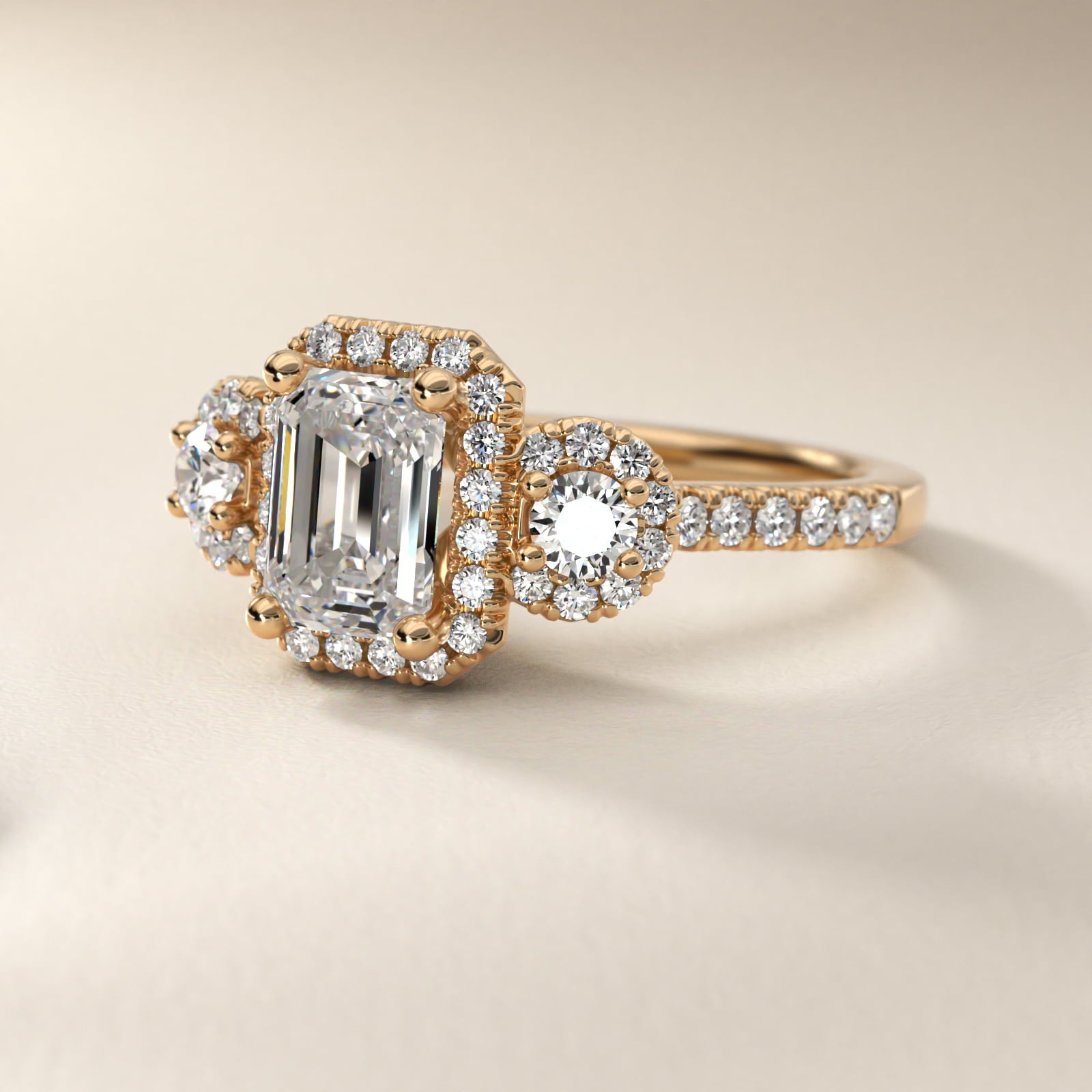 Three-Stone Halo Diamond Engagement Ring in 18k Yellow Gold - Emerald Center