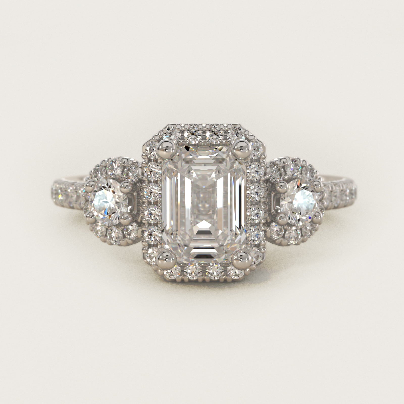 Three-Stone Halo Diamond Engagement Ring in Platinum - Emerald Center
