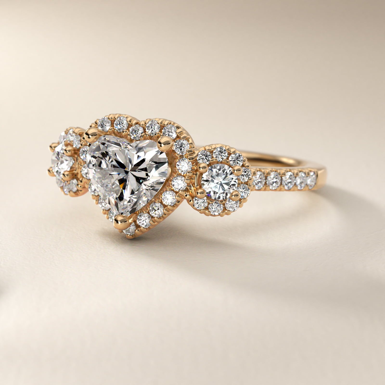 Three-Stone Halo Diamond Engagement Ring in 18k Yellow Gold - Heart Center